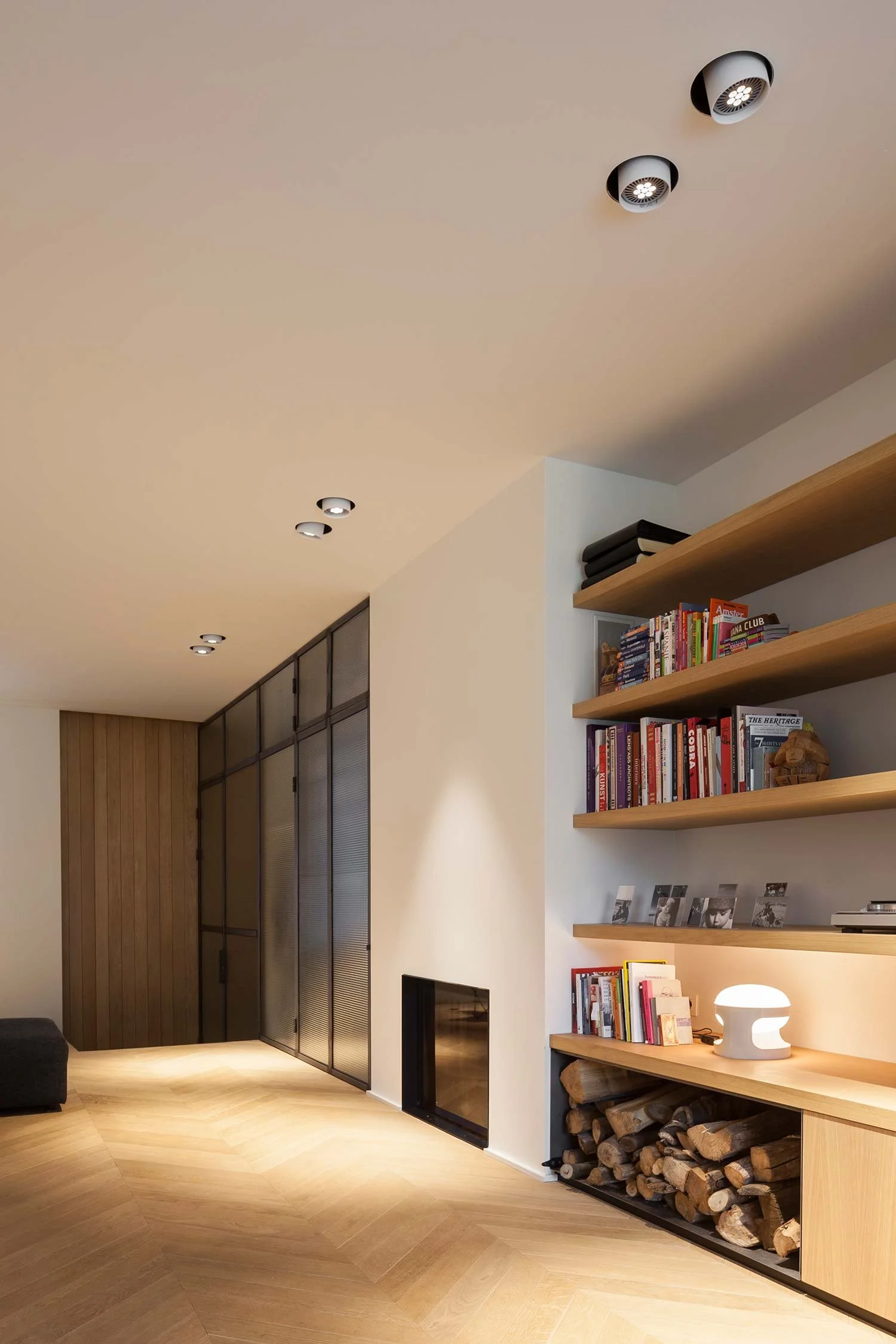  What was once a barn in Limburg, Belgium, has been transformed into a warm and contemporary family home — balancing the character of its original setting with comfort, openness and refined detailing. 