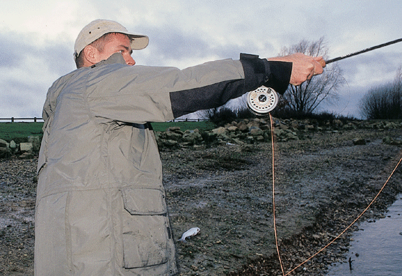 When casting into a headwind Iain releases the forward cast almost parallel to the water - any higher and the wind will force the line back.