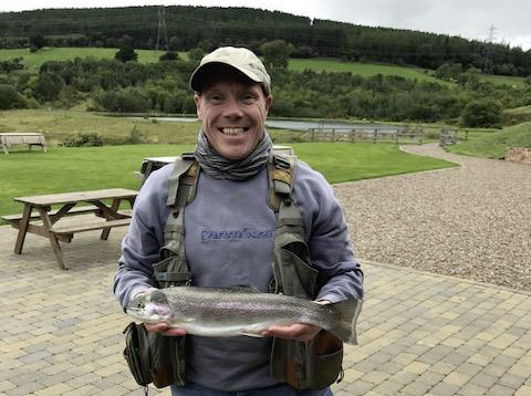 Mathew Lowery from Whitley Bay, with a 4lb Rainbow from Thrunton fishery.