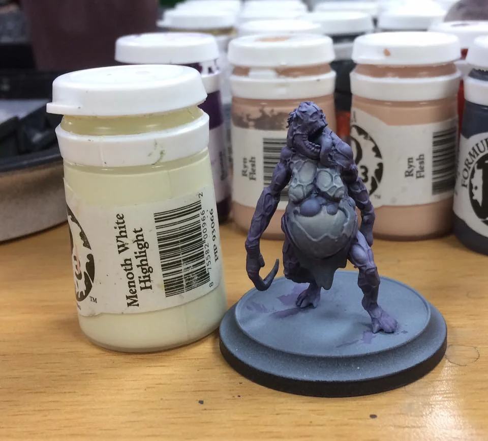 The veins are picked out with Menoth White highlight.
