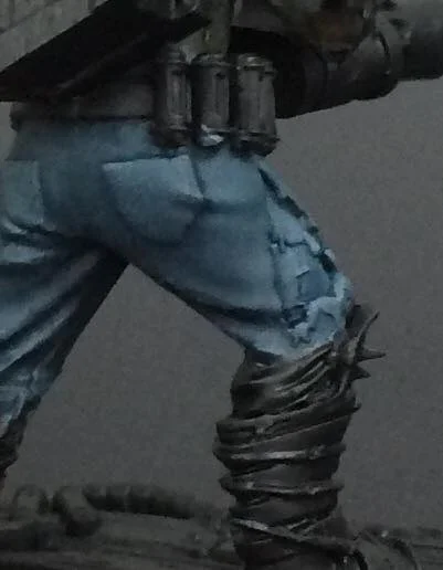 Coal black is glazed over a zenithal undercoat. Do not allow this to pool up.