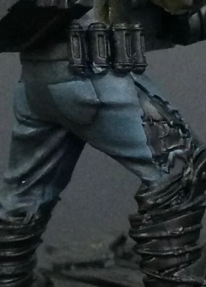 Thamar Black is glazed into the recesses and feathered out with a damp brush.
