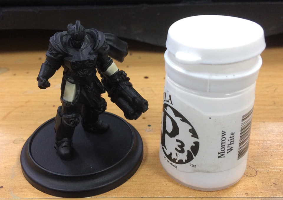 Highlight with Morrow White towards the edges of the panels or on the highest point of the curved armour sections and you're done.