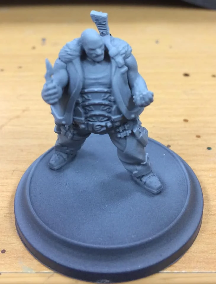 Zenithal undercoat is applied with an Airbrush. You can use rattle cans for this process, however, it will not be as fine. I used Thamar Black, then Ironhull Grey, then Morrow White.