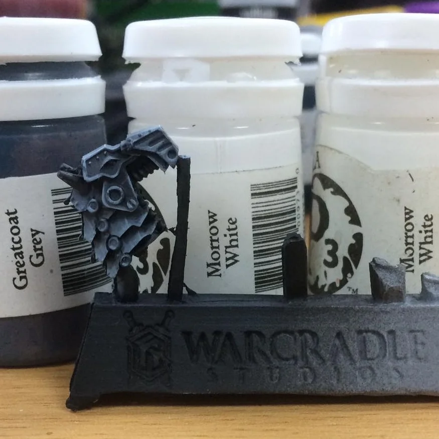 Add more white to around two parts white one part grey. Add a wee bit more water to around a 7/1 mix. This is applied as an edge highlight and to enhance the scratches. This will be thin but allows for seamless blending if repeated two or three times.