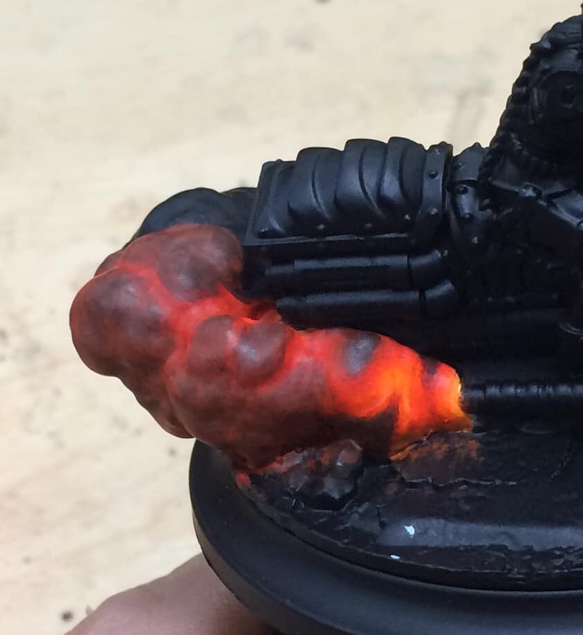 Thamar Black was glazed over the bulges to add further depth.