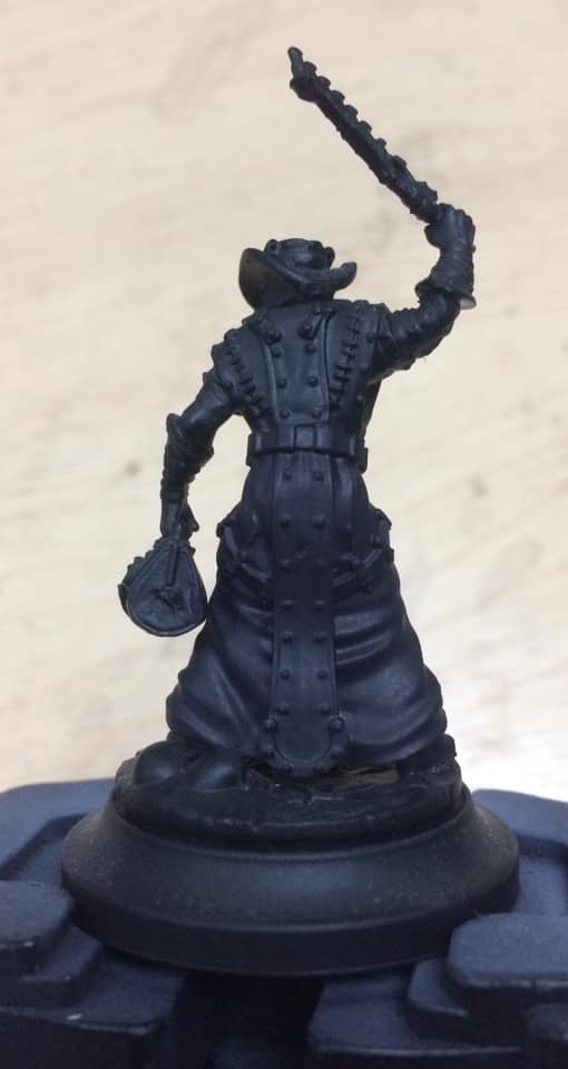 The robe was base coated in a 1:1:2 mix of Thamar Black, Beaten Purple and water.