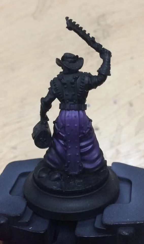 On to highlighting - the bottom quarter of the robes was highlighted with Beaten Purple