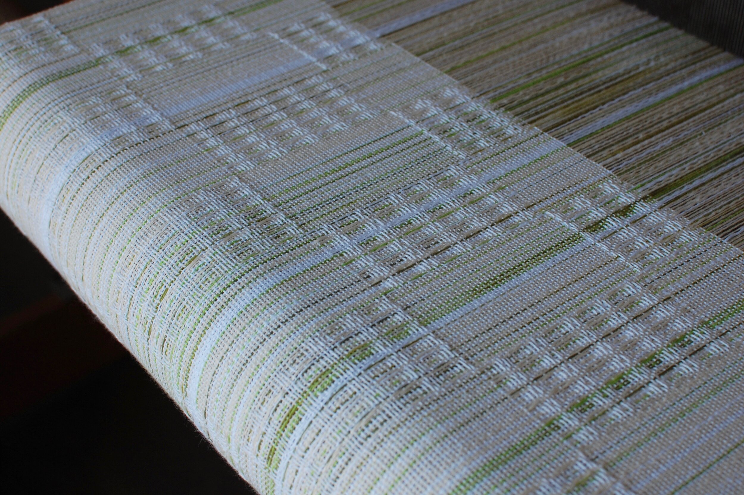 Handwoven towels on the loom