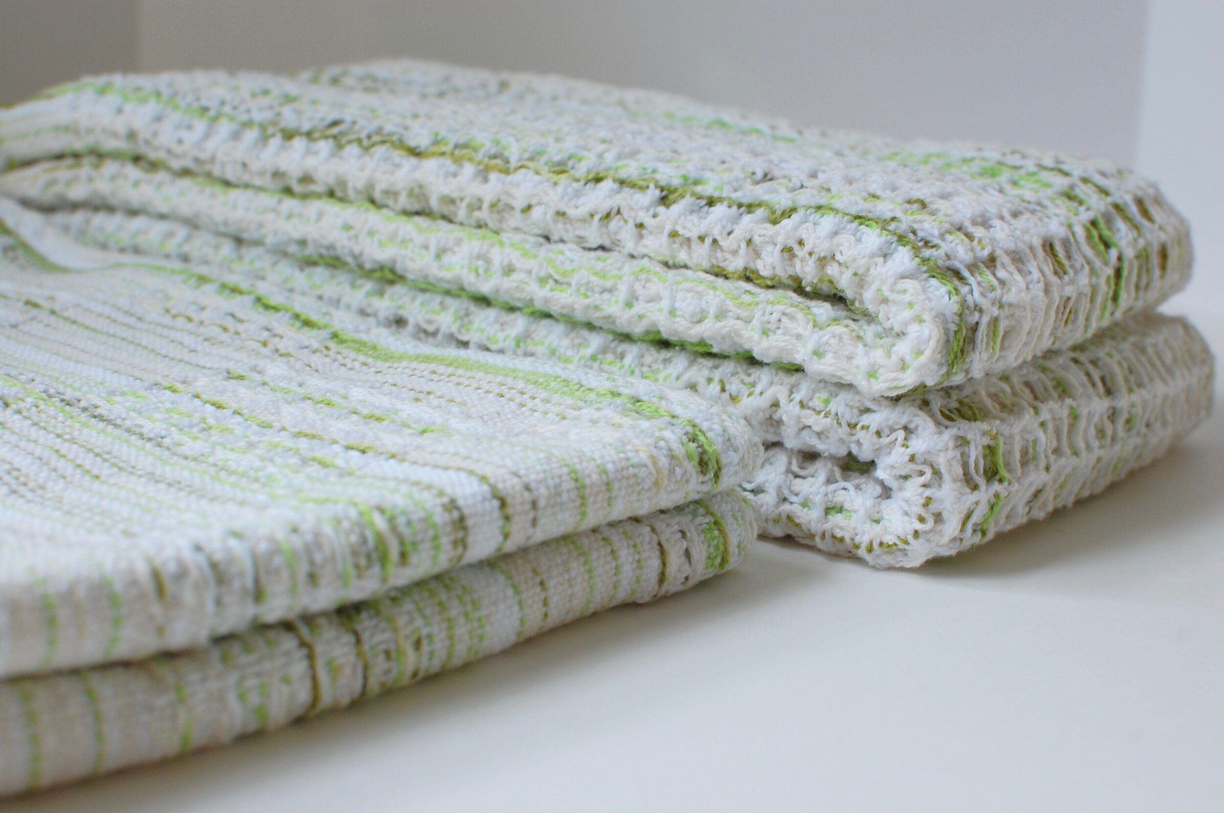 Folded handwoven and hand-dyed cotton towels