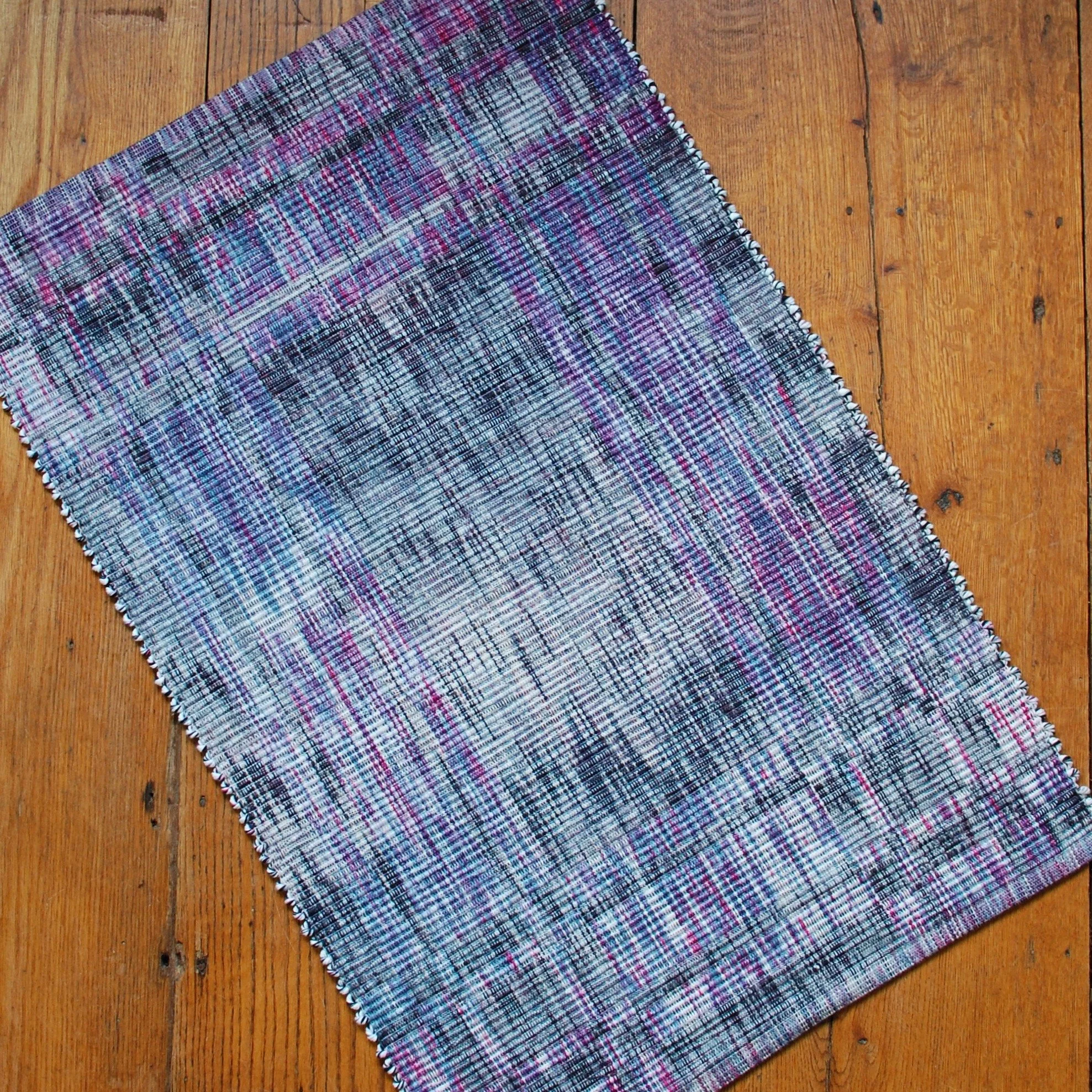 Hand-dyed handwoven rug purple blue black