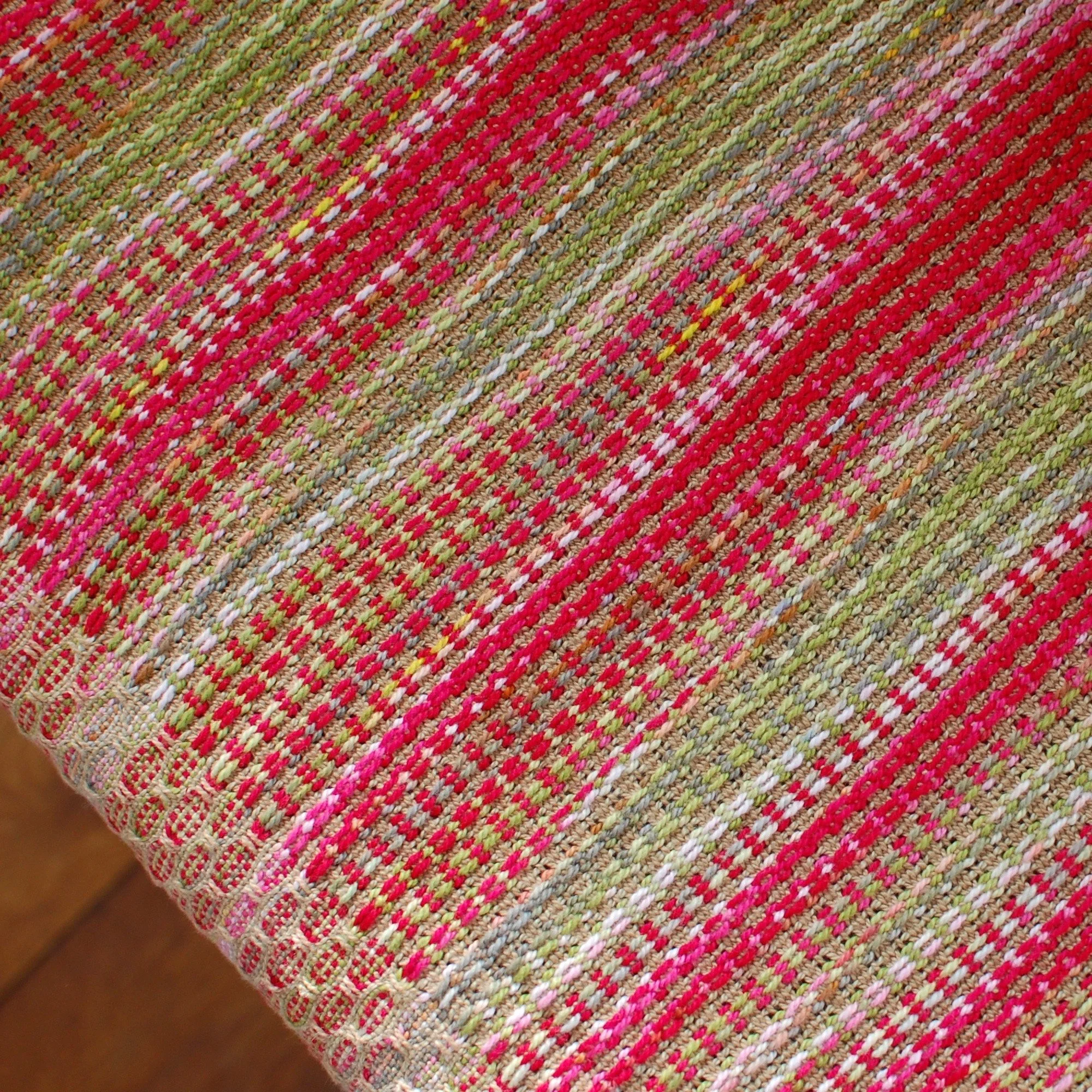 pink and green cotton throw blanket