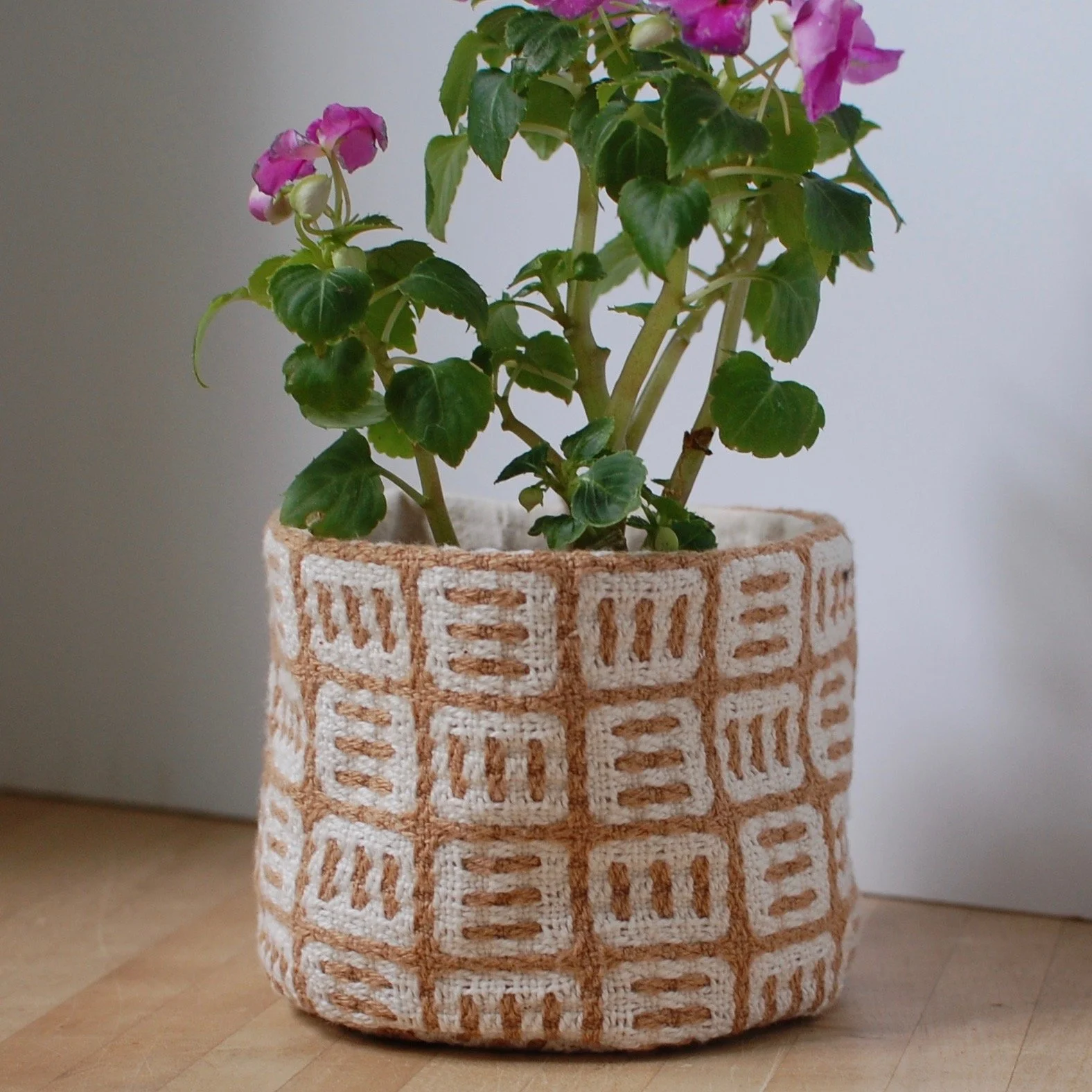 Small plant cover made of organic handwoven cotton fabric