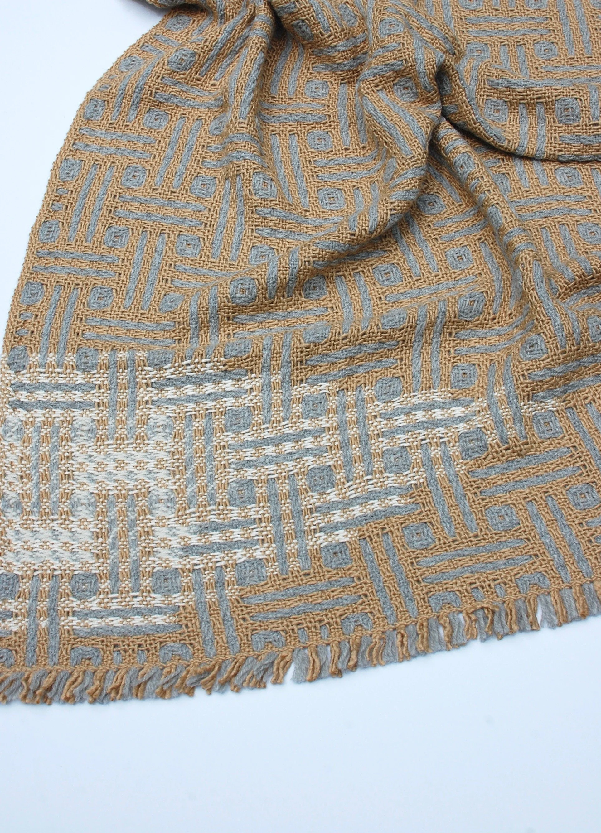 Handwoven blanket with an insert