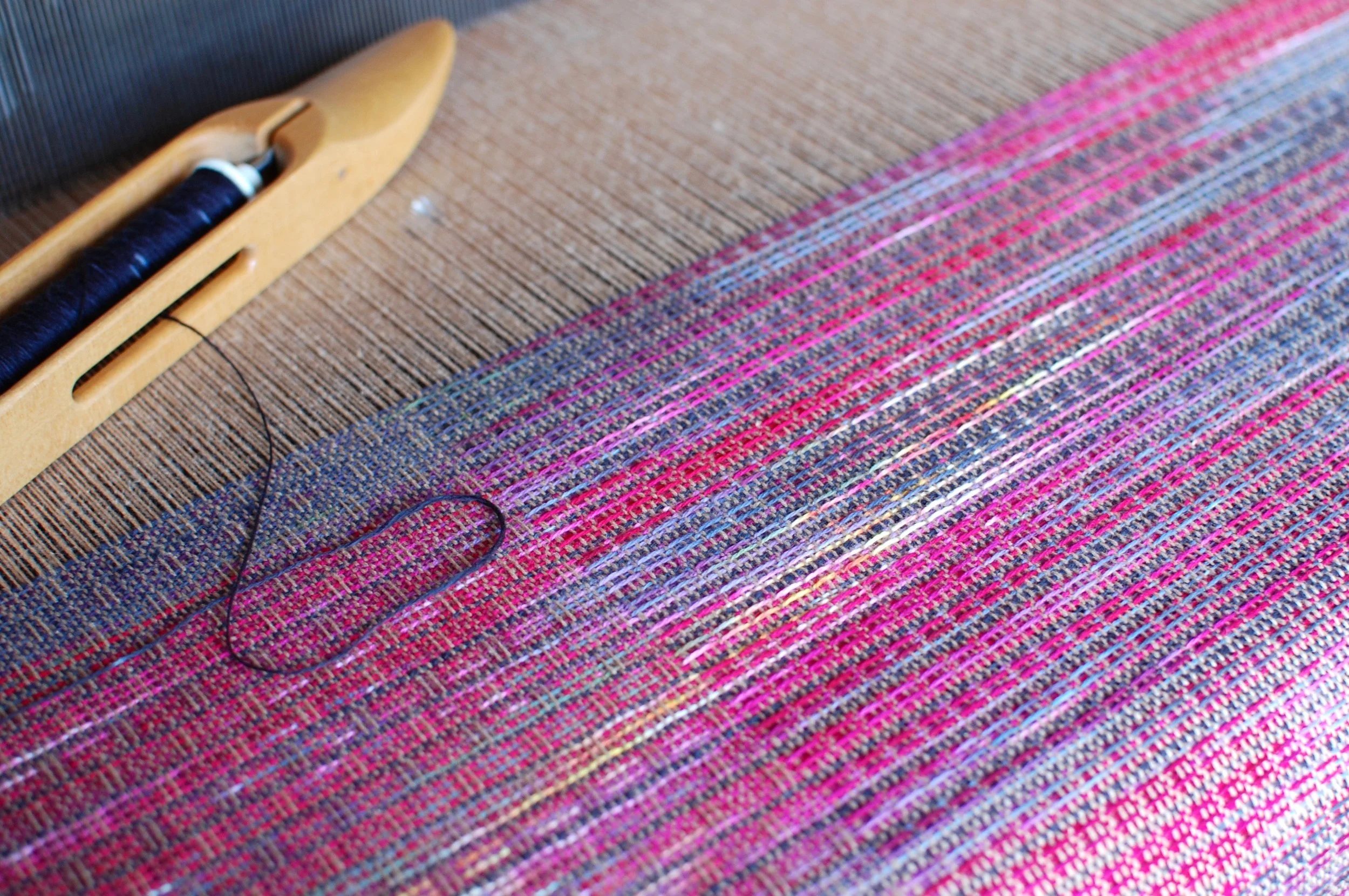 Custom handwoven blanket being woven