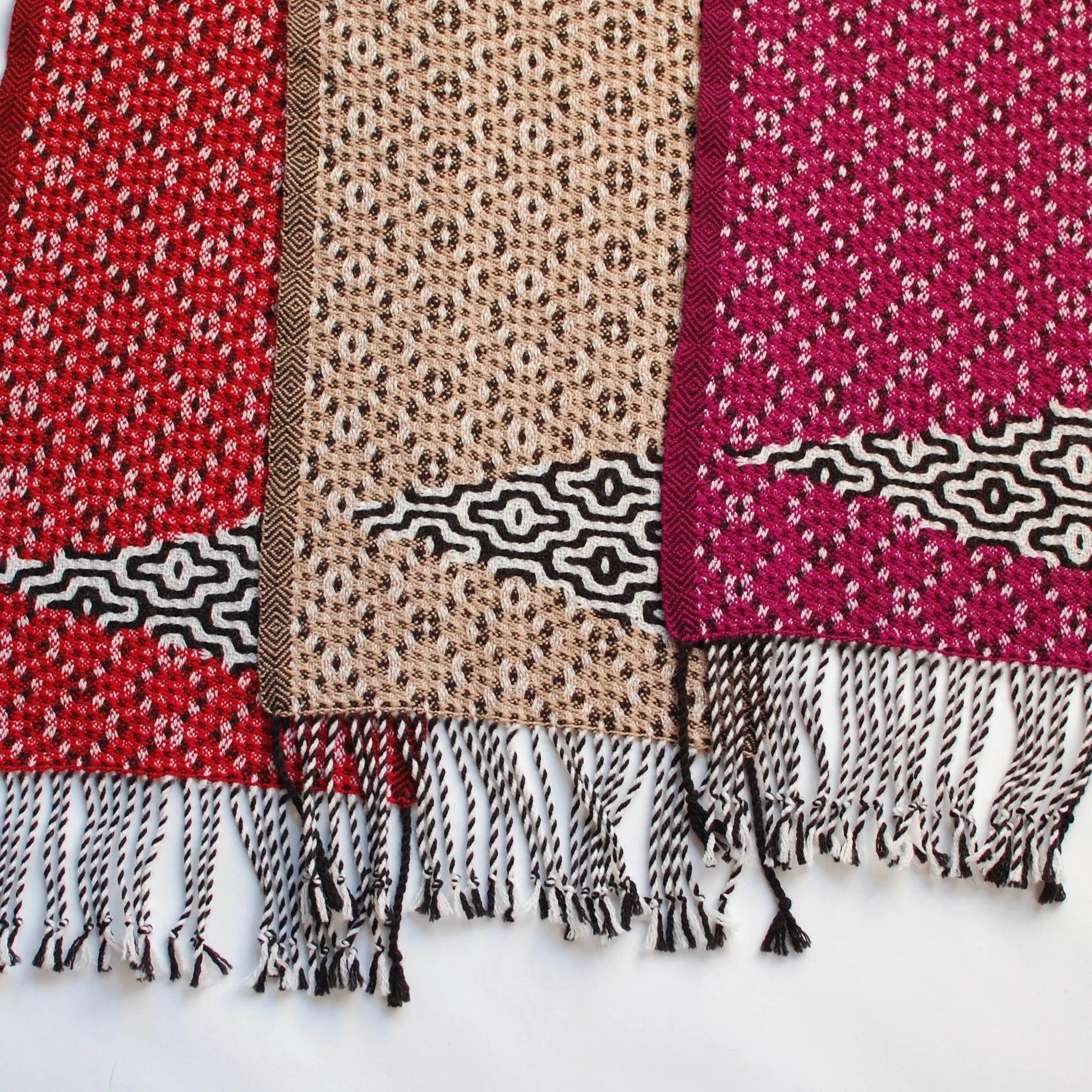 Three handwoven scarves with interesting deflected doubleweave motifs