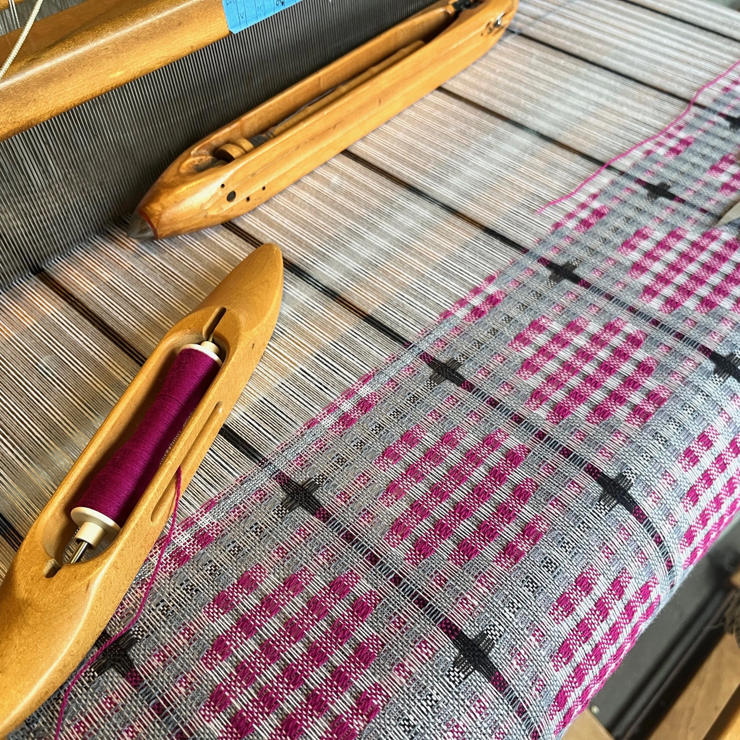 Merino cloth being woven on an AVL loom