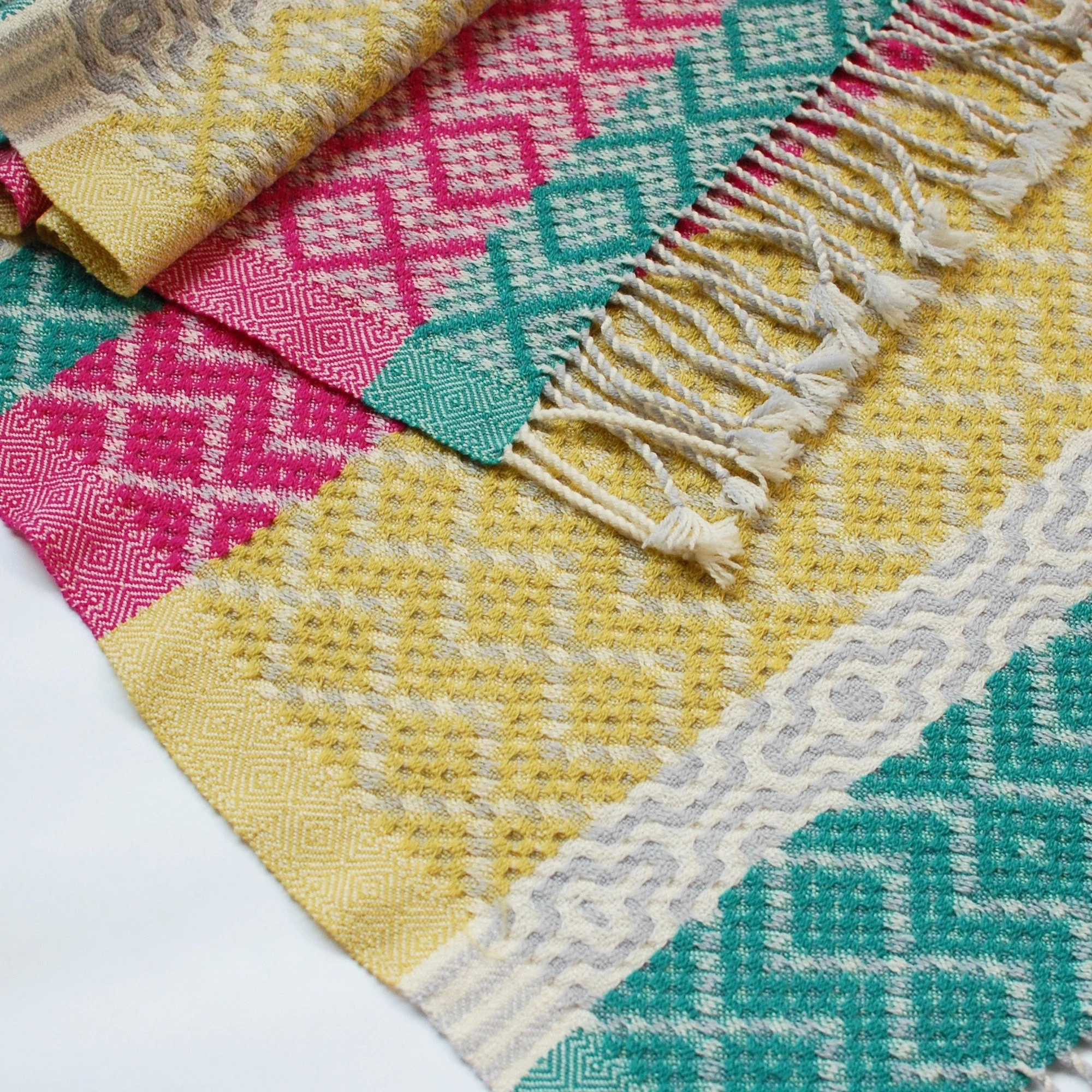 Handwoven cozy scarf with a fun 90s aesthetic.