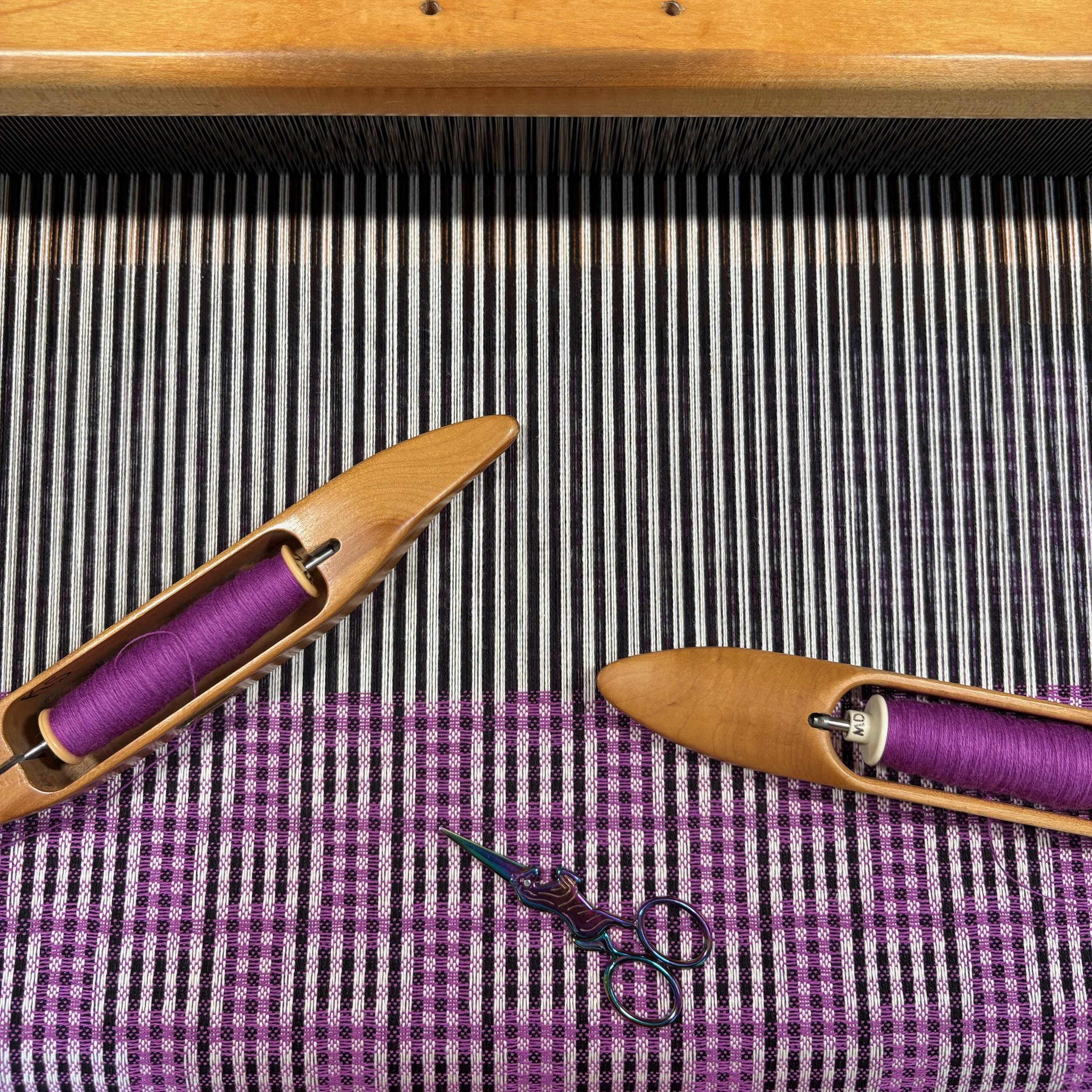 Handwoven fabric being woven on an AVL loom made in Connecticut, America, small batch textiles