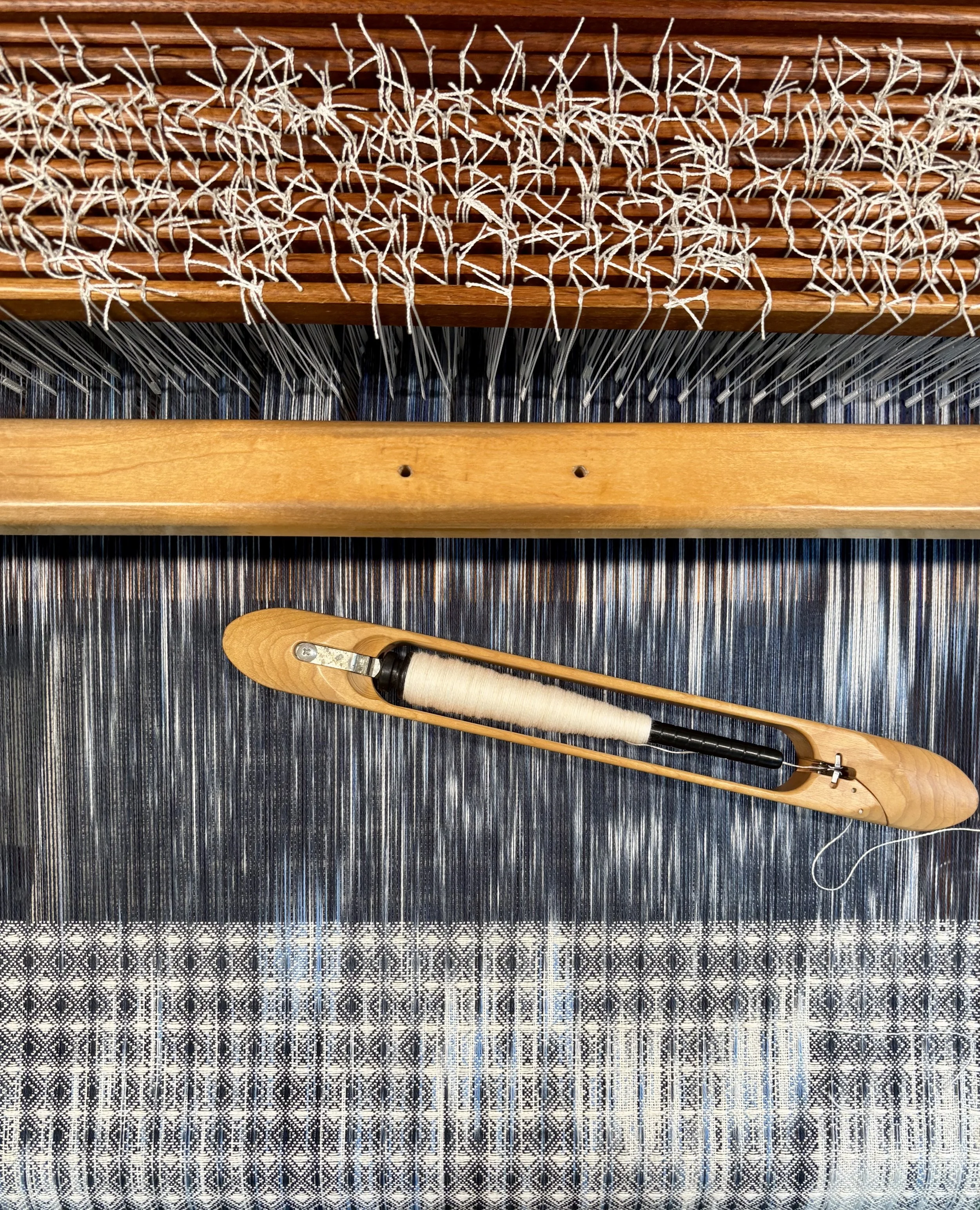 Handwoven cotton towels on an AVL loom with an end-feed boat shuttle.