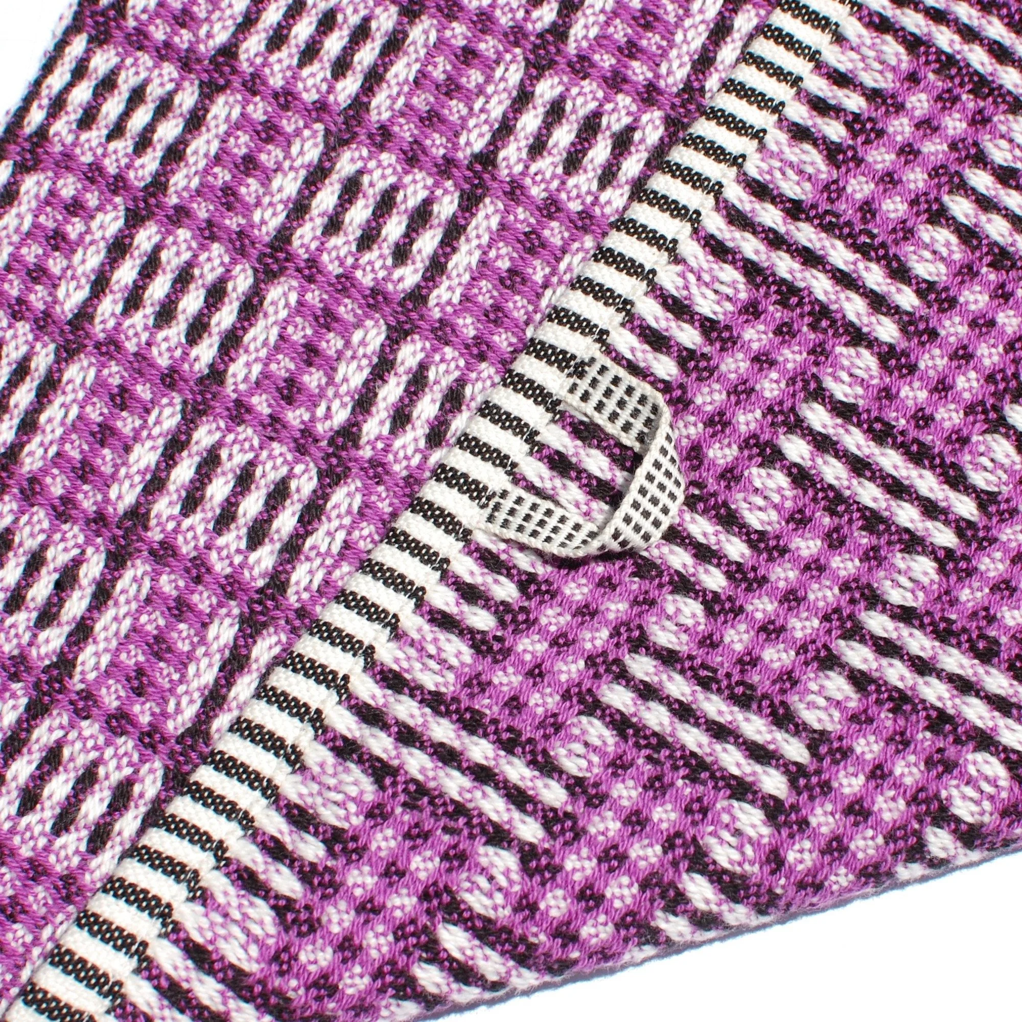 Modern bright pink handwoven towel with black and white loop
