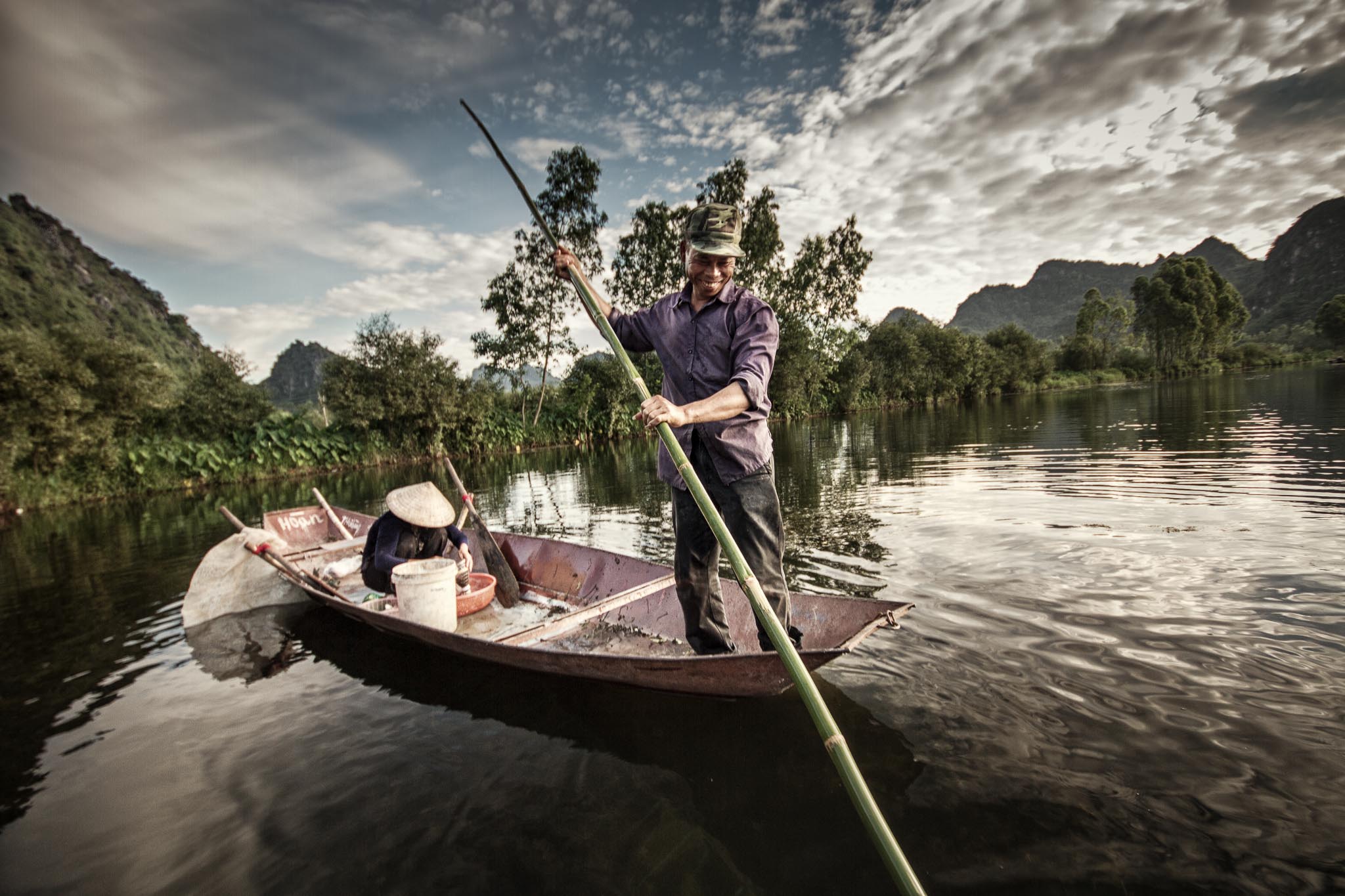 A rural "street photo", which is about as far from a street as you can get. But this could also be Travel- or Documentary Photography, or an Environmental Portrait. (Vietnam)