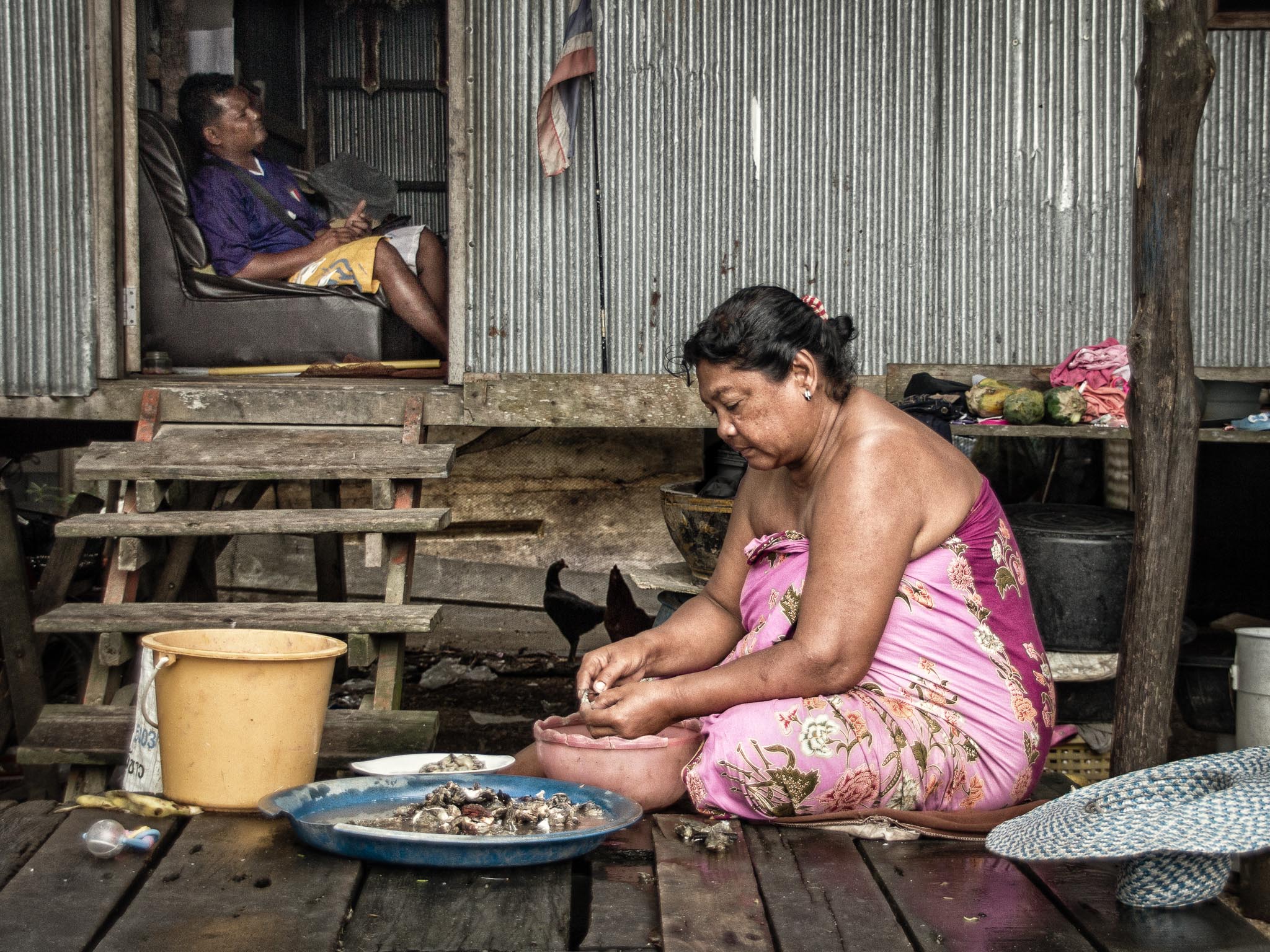 A scene inside a sea gypsy village. Street-, Documentary- or Travel Photography? (Phuket, Thailand)