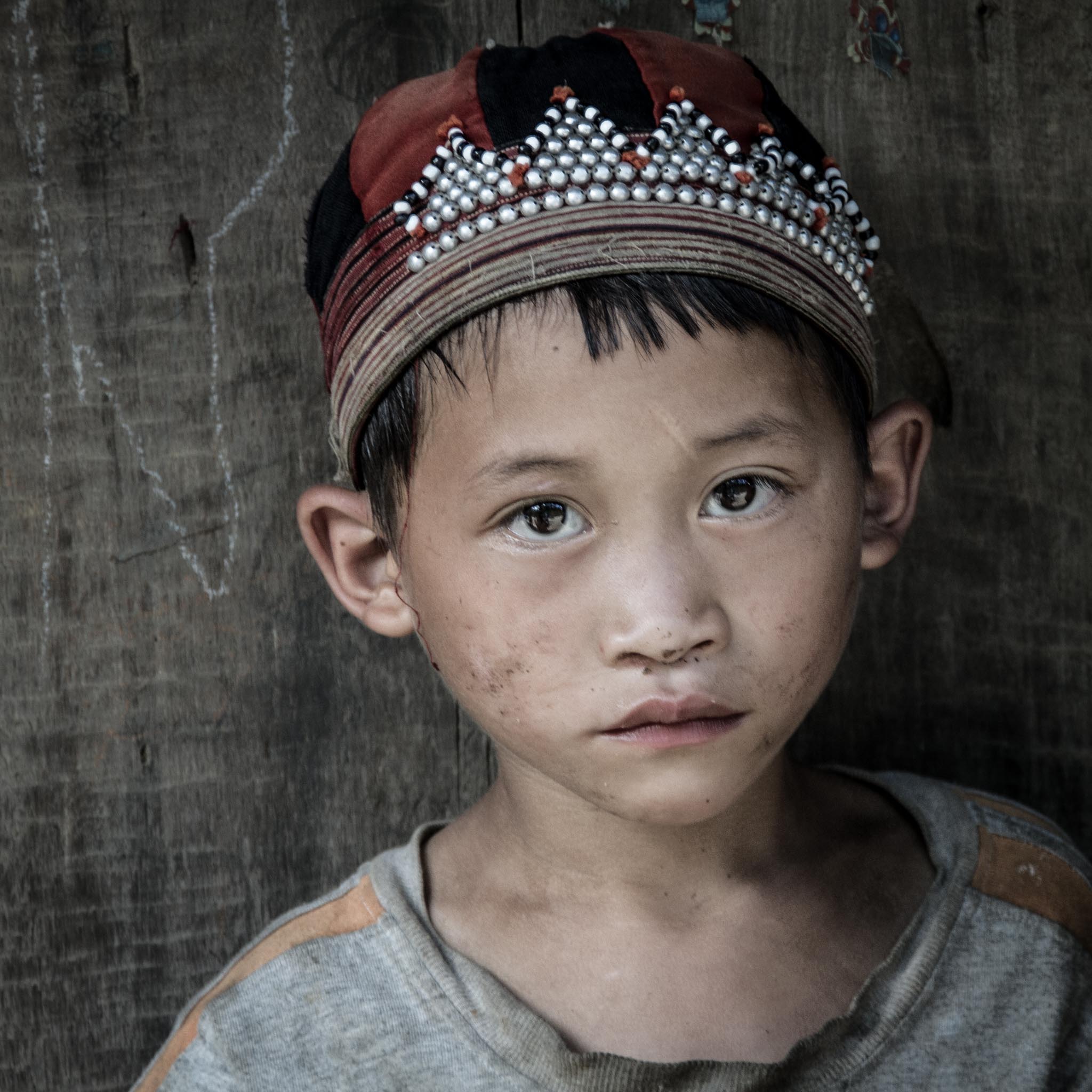 A Red Dao boy at the filling station ...