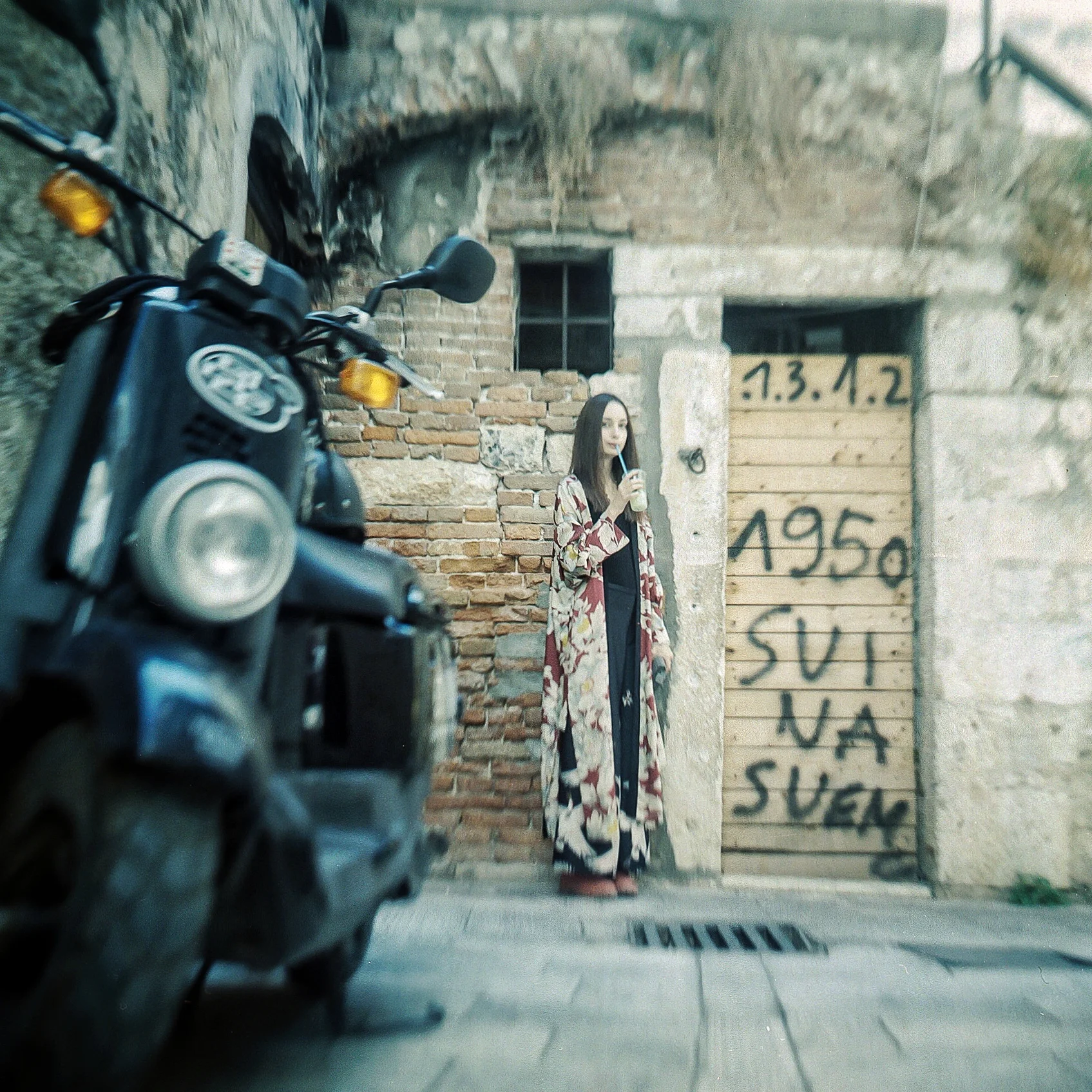 My daughter joining me on a walk in Trogir, Croatia.