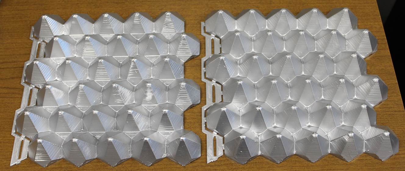 Figure 1. Prototype architectural tiles created using an equilateral triangle truncating object with a 60 ° truncation rotation