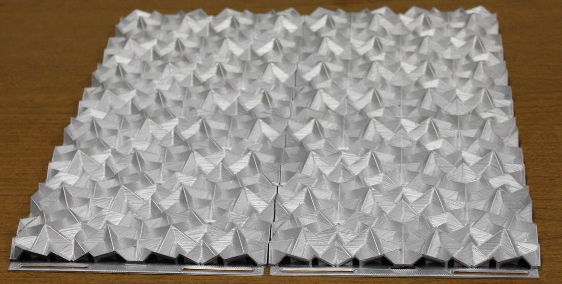 Figure 5. 2 x 2 array of architectural tiles created using an isosceles triangle truncating object with a 45° non-congruent angle and a 15° truncation rotation