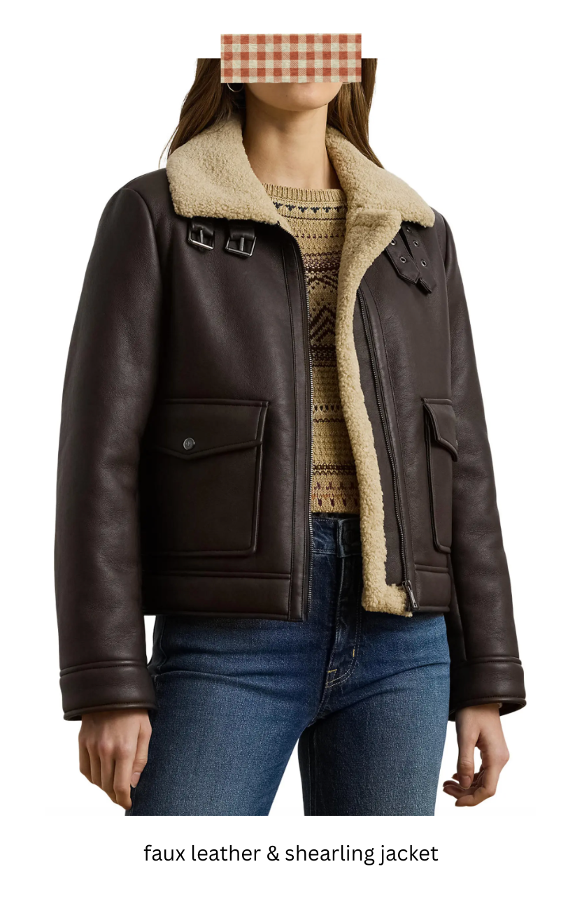 Woman wearing a brown faux leather and shearling jacket.