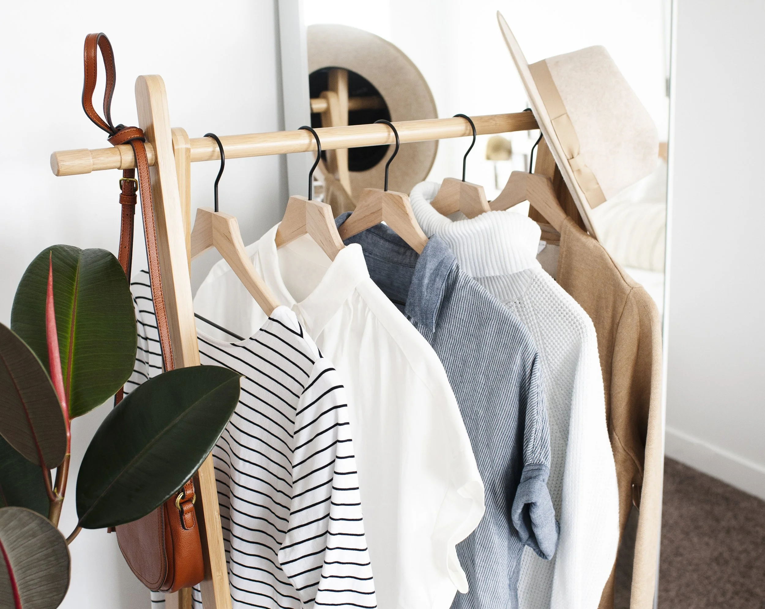 clothing rack of wardrobe essentials clothes.