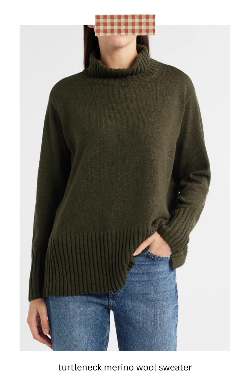 Woman wearing an olive green turtleneck merino wool sweater.