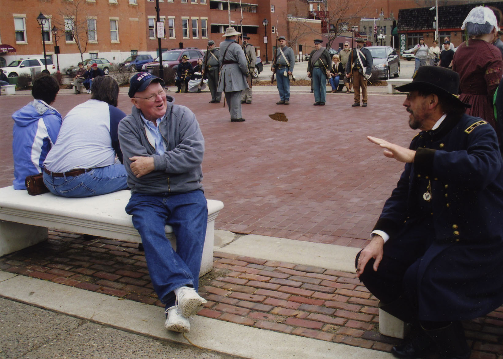 Tom Wolfe talking to a historical reenactor, Galena, Illinois; undated