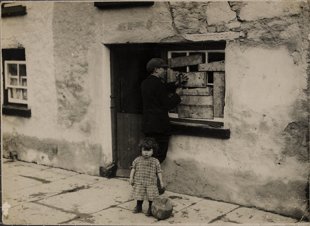 House in Templemore, County Tipperary, after a raid by the Black and Tans, ca. 1921 ( National Library of Ireland )