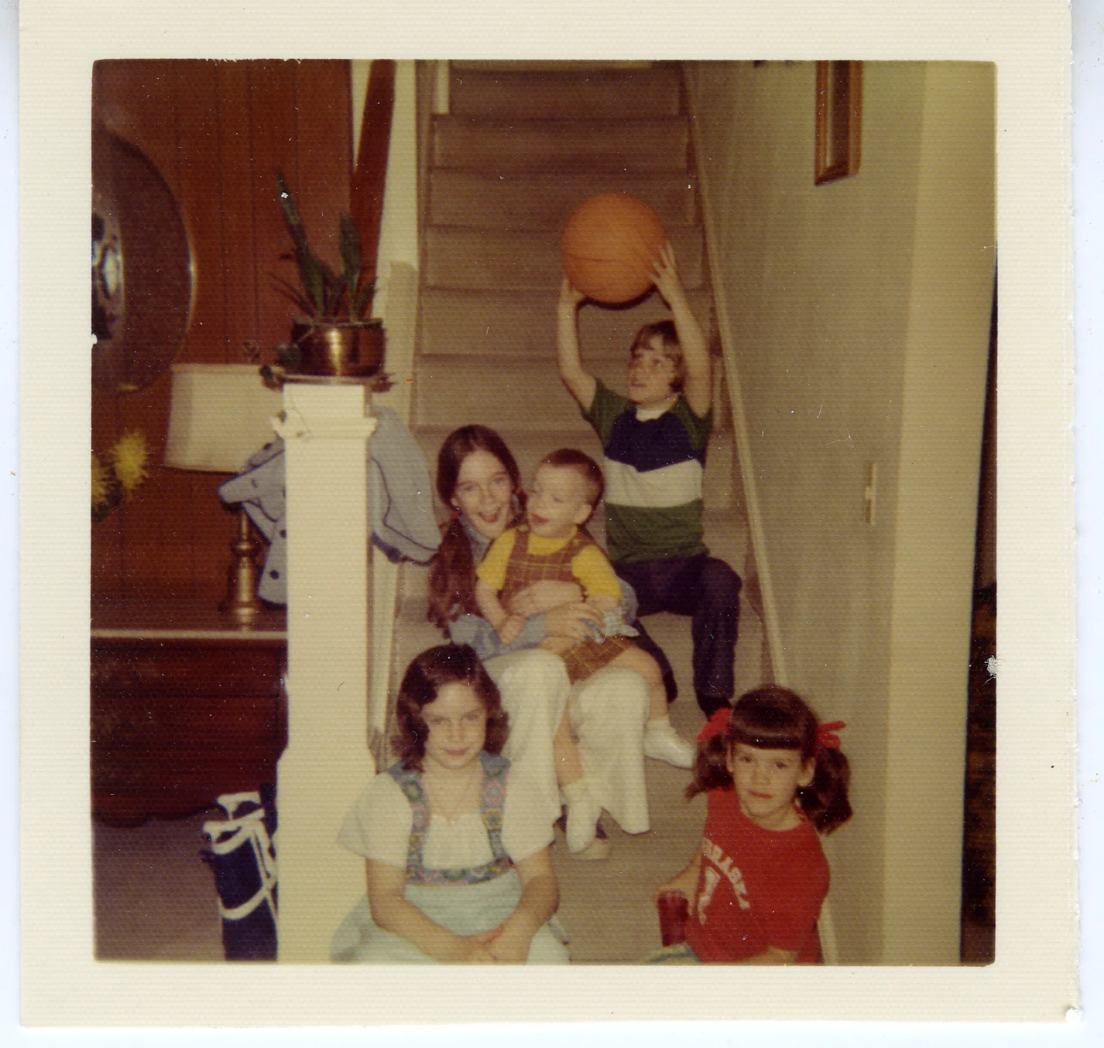 From bottom left and clockwise: Kate Wissing, Beth Wissing, Brendan Wolfe , John Wissing, and Bridget Wolfe, at the Wissing home in Davenport