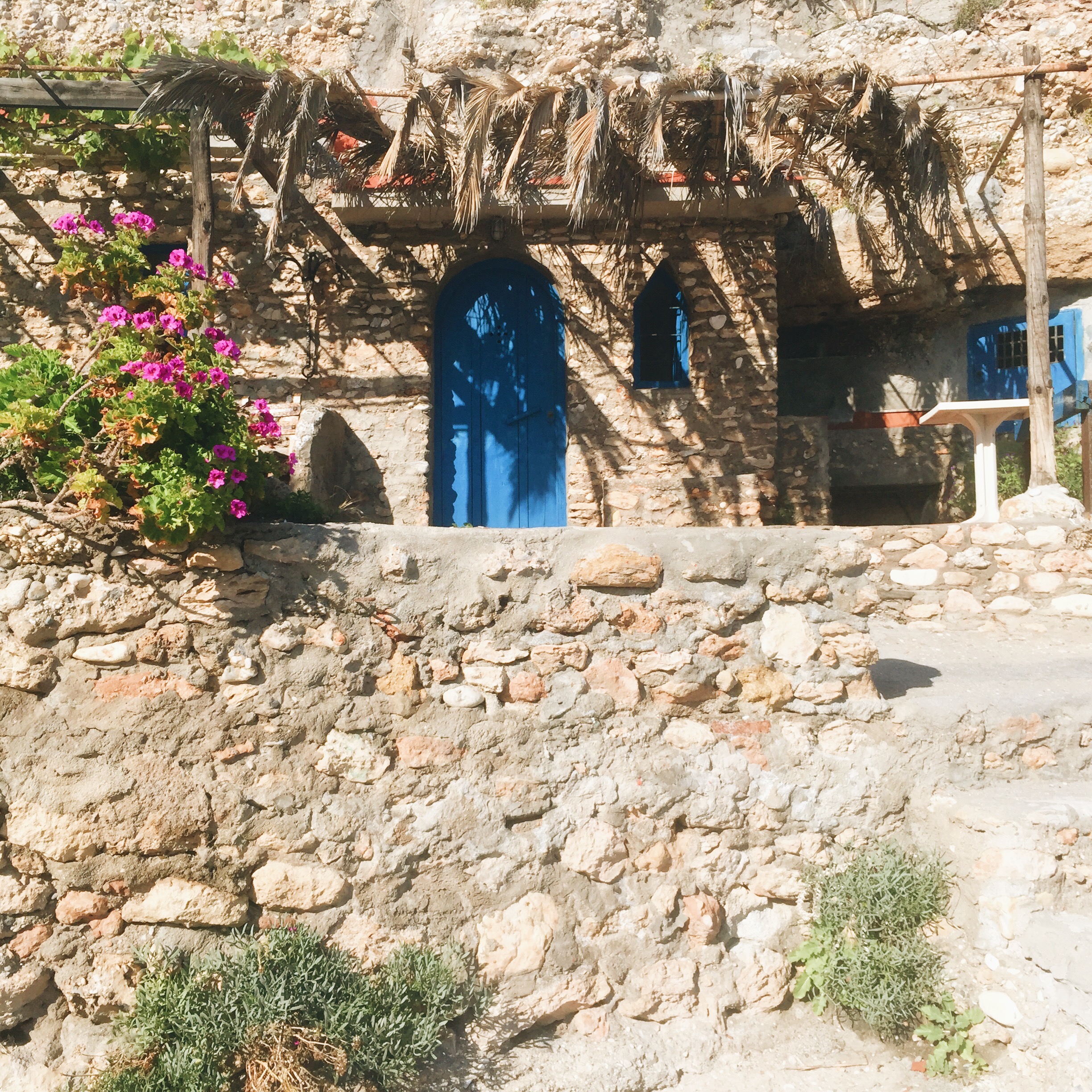 The little blue door on the beach.
