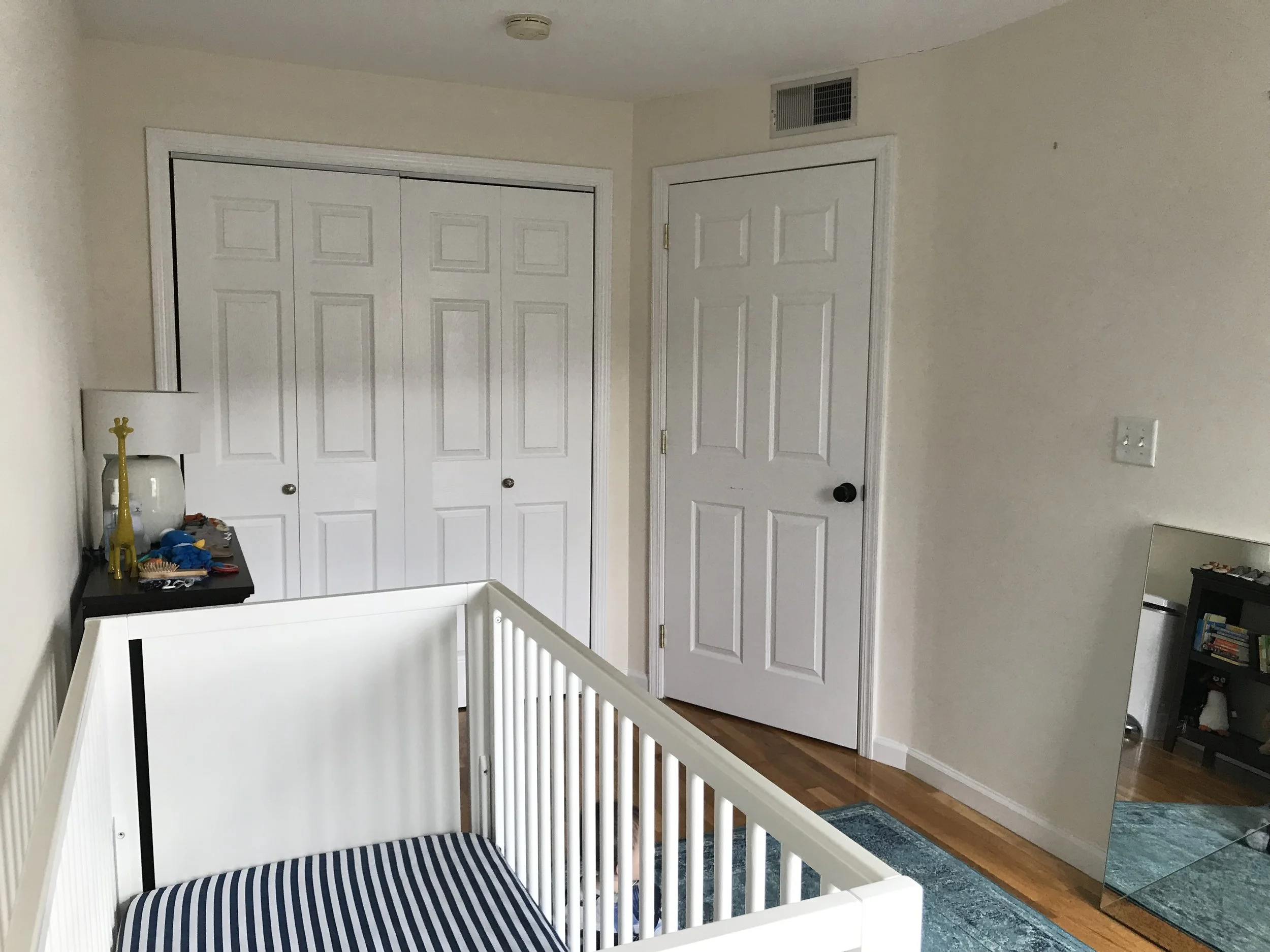 Luckily, the large closet housed most of the baby gear so we didn't need storage pieces in the room!