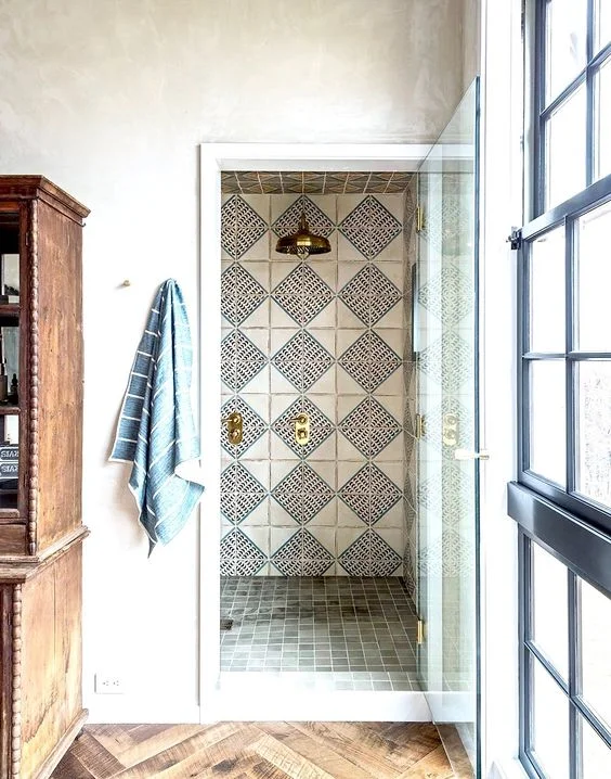 Stunning bathroom design with hand painted terracotta by Jennifer Bunsa