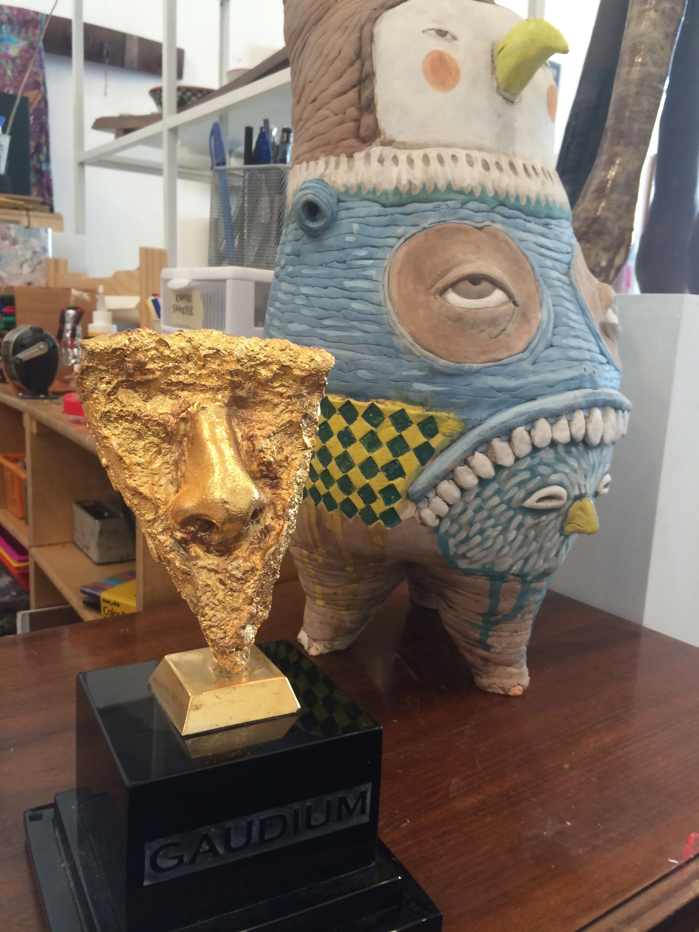  'Gaudium' 24carat gold plated bronze and glass by Evan Burnette  'Totem Bird' ceramic sculpture by Chris Granillo 