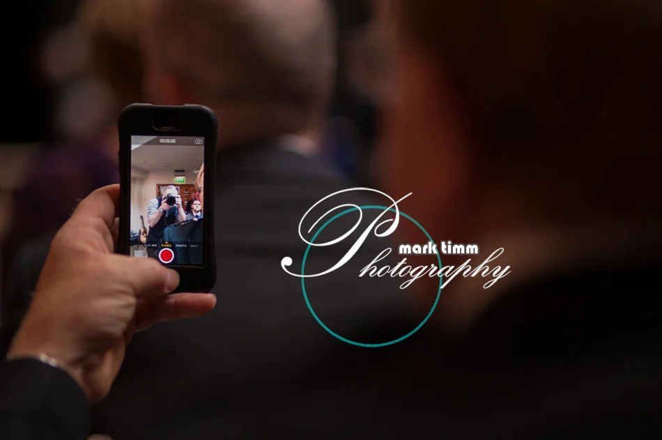 Spent 30 seconds carefully creeping down the aisle to see what this guy was filming and get one of those 'pic within a pic' shots. Turns out he was subtly trying to film the bride's arrival and I just got a shot of my bald dome.