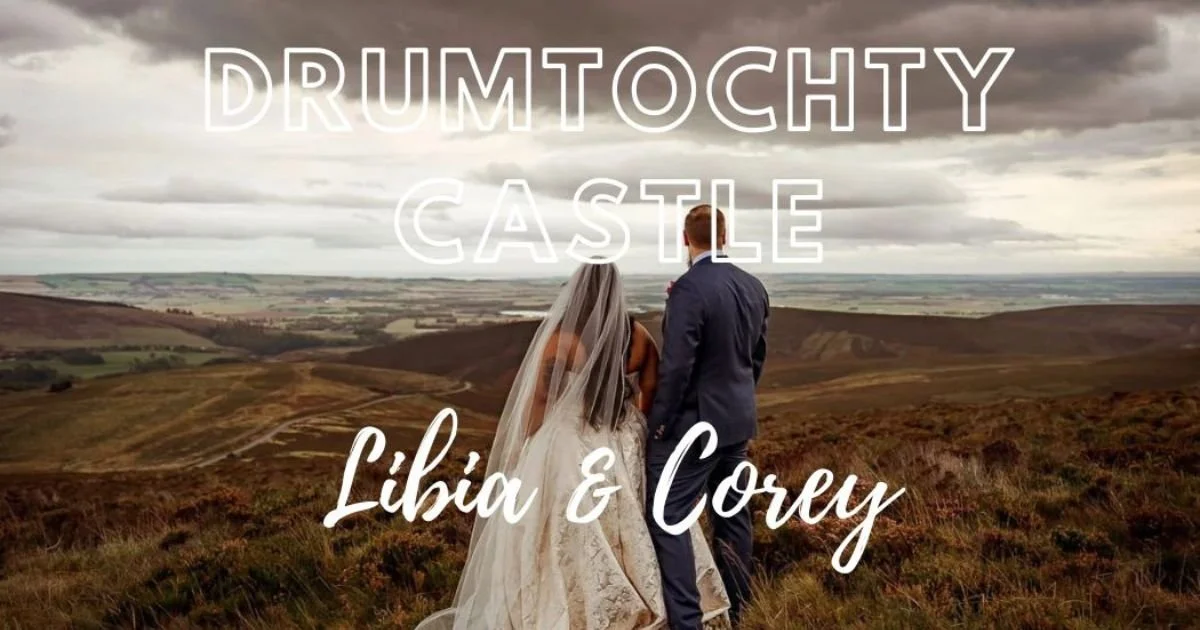 Wedding couple stand looking out onto Scottish Hills and Fields at Drumtochty Castle Wedding venue