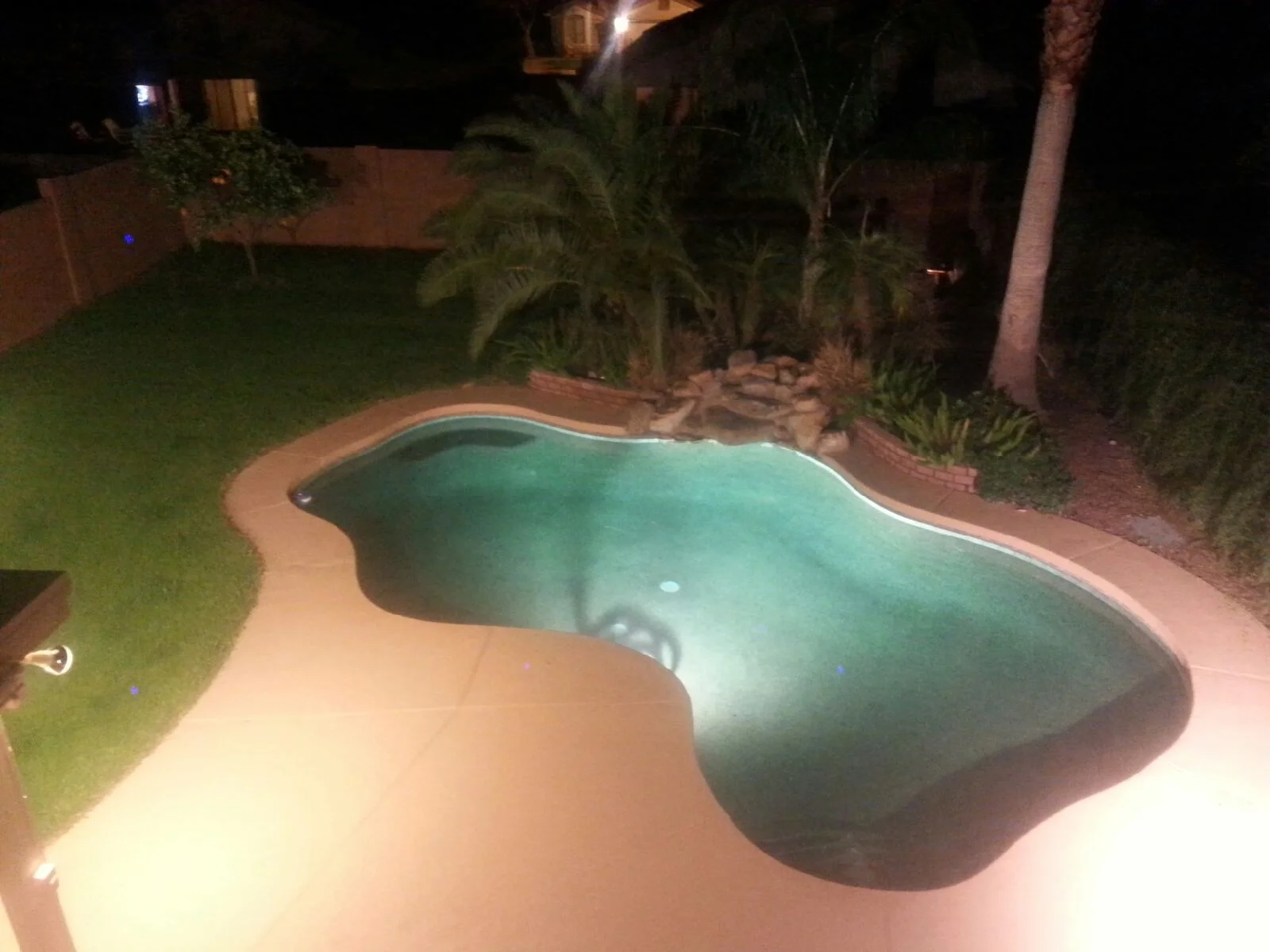 Night lighting in an oasis pool