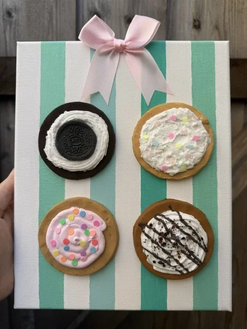4 cookies on green and white stripes.jpeg