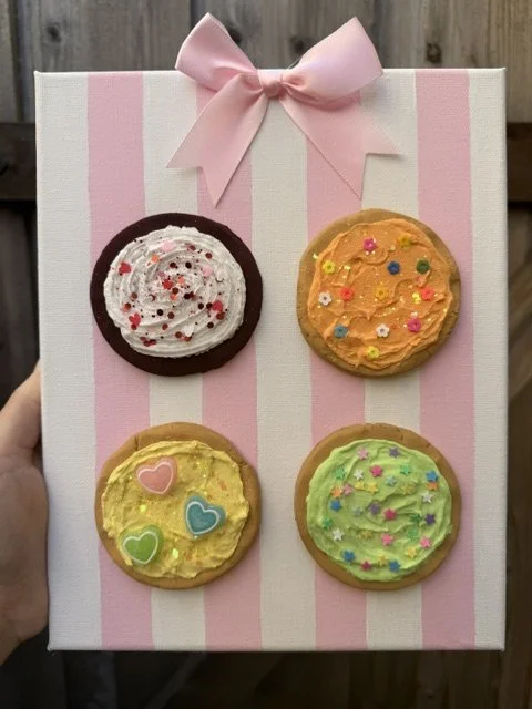 4 cookies on pink and white stripes.jpeg