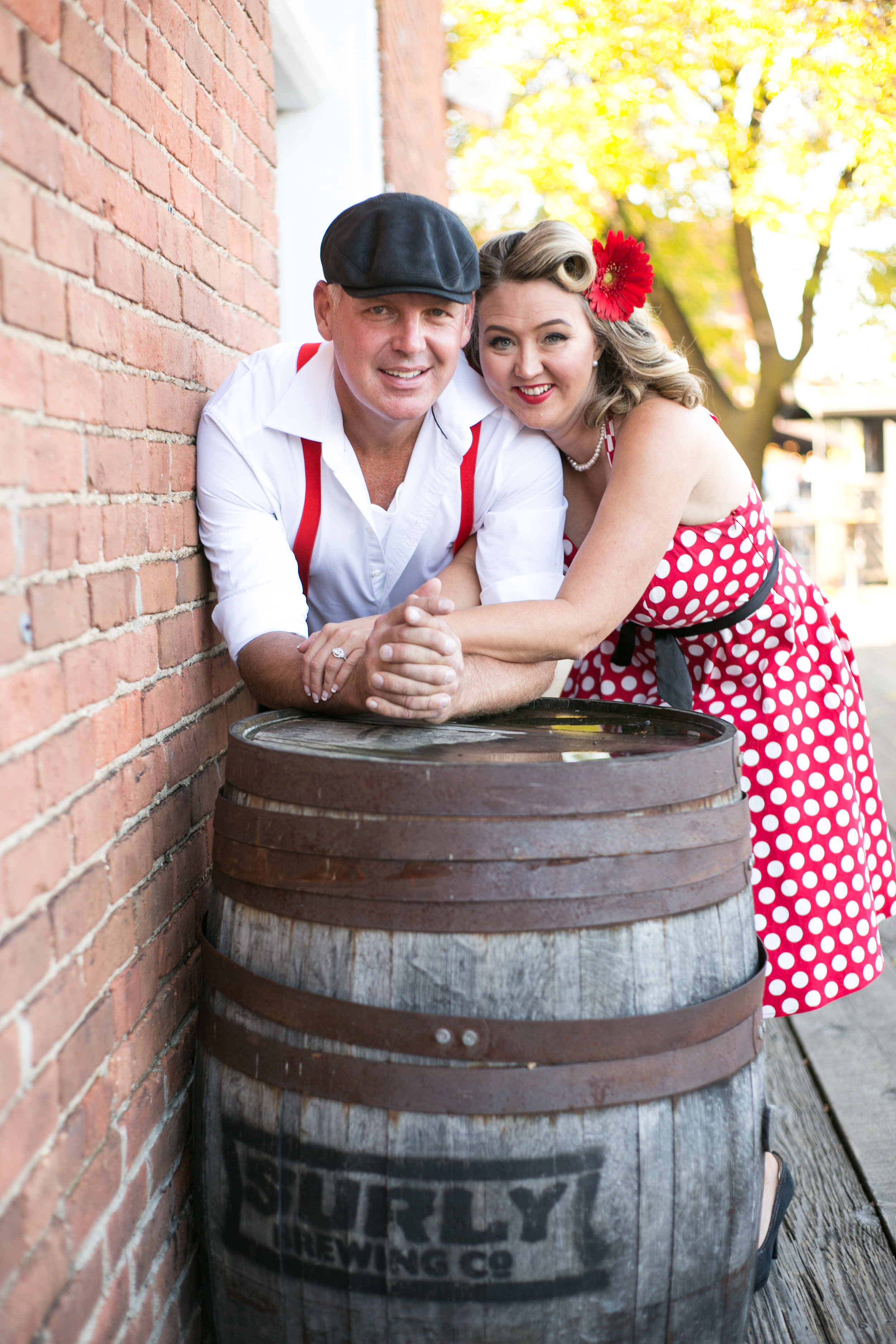 Vintage engagement shoot couple holding hands in Stillwater MN