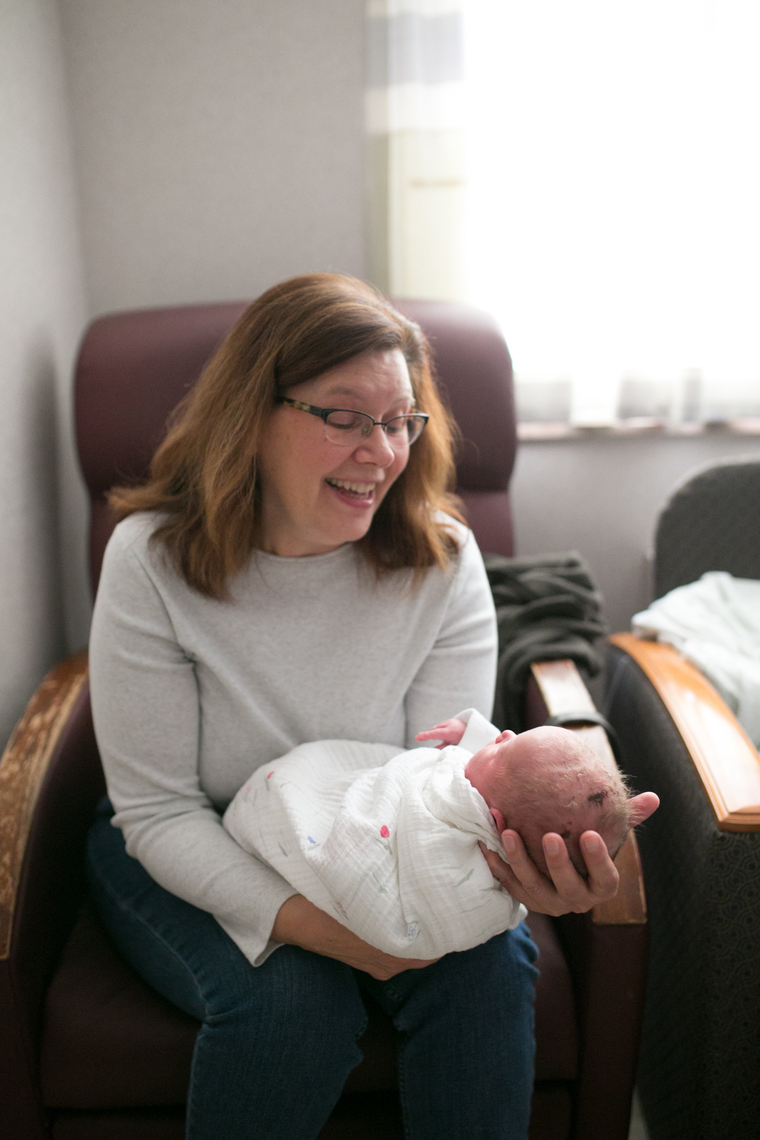 grandma kummer holds newborn baby girl marshfield