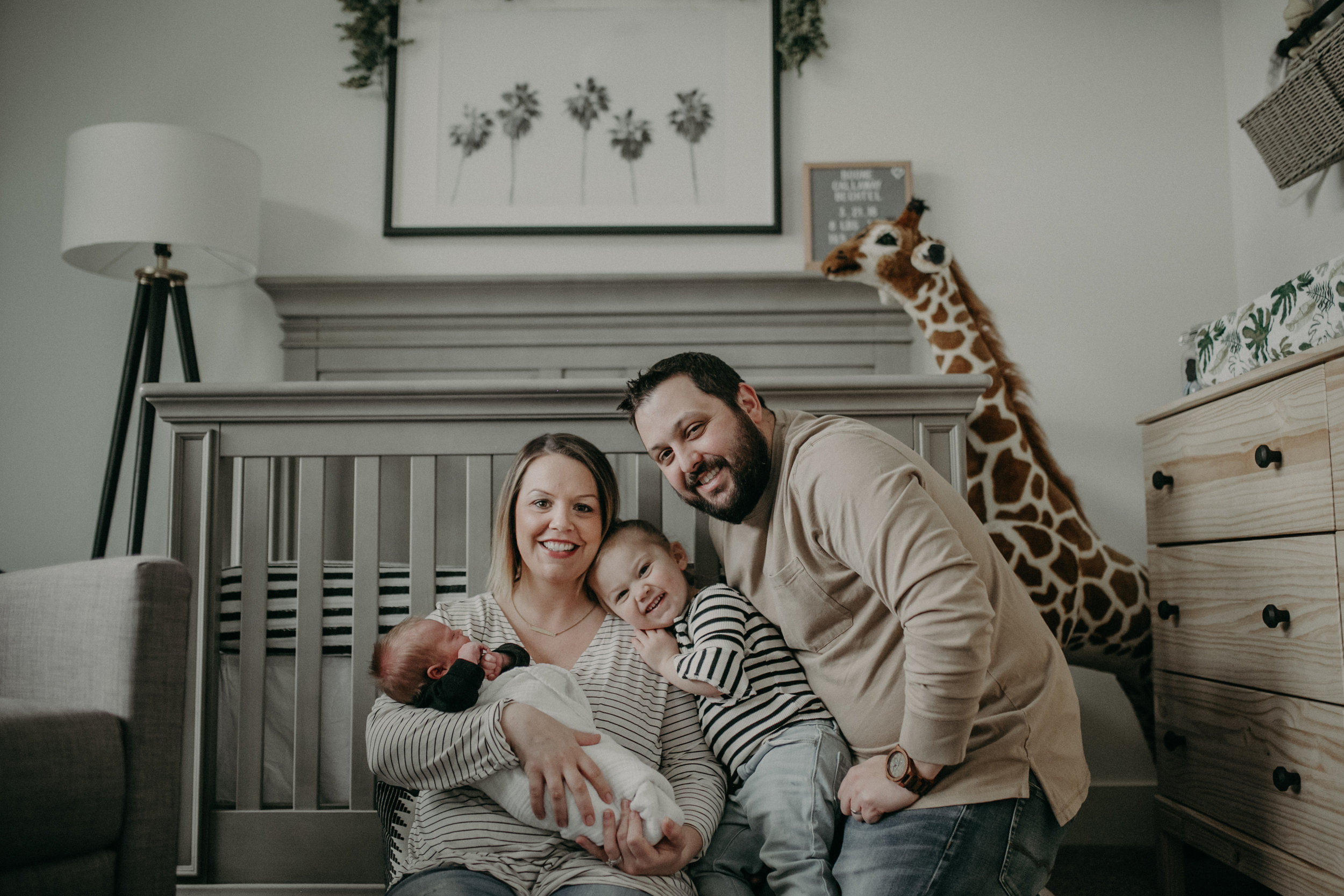 river falls wi lifestyle family in nursery newborn baby