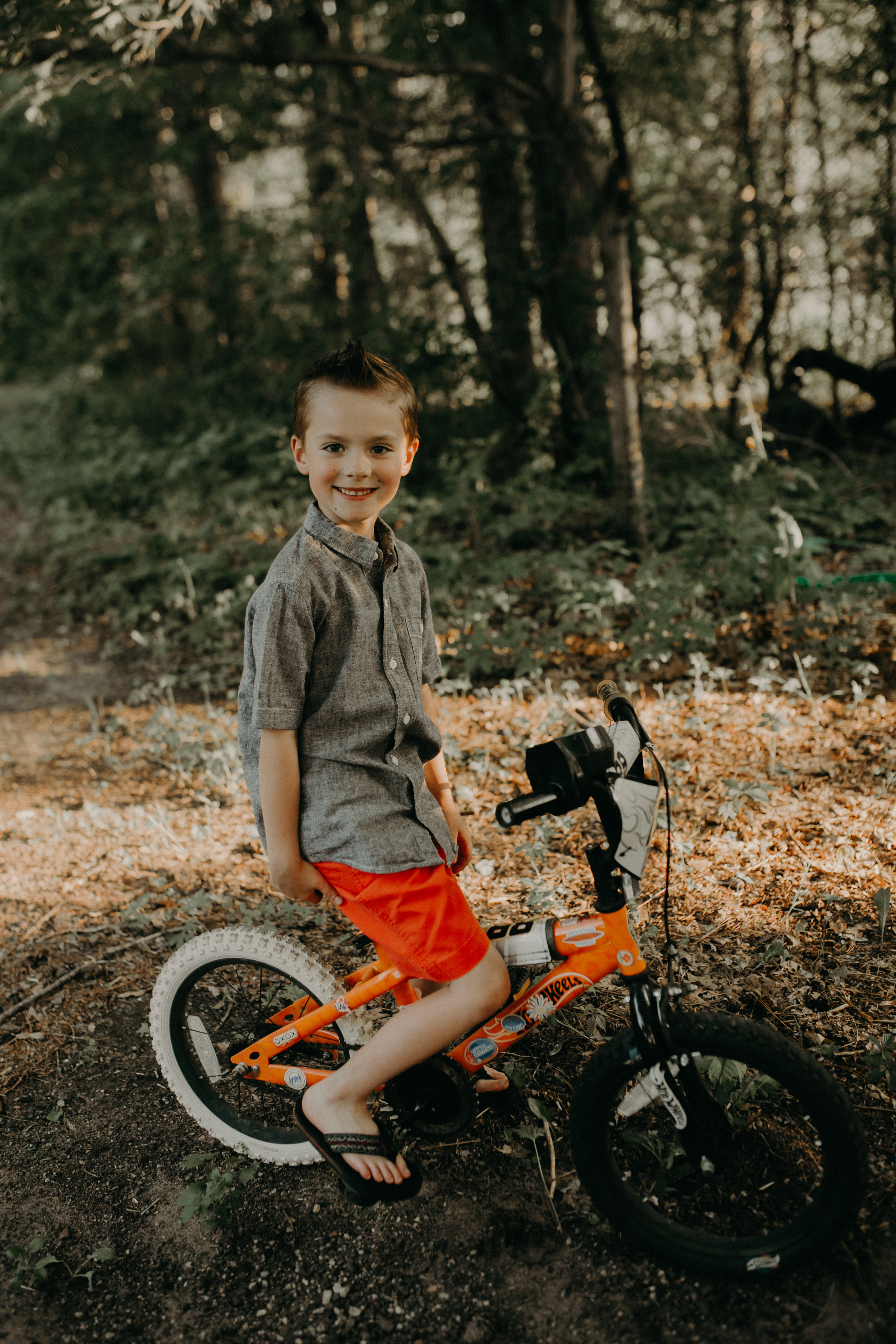 boy on a bike in river falls wi